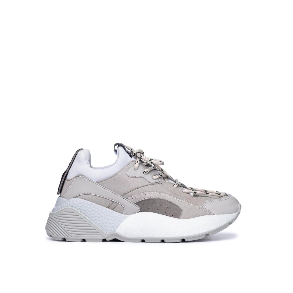 Stella McCartney Graue Sneaker aus veganem Leder mit klobiger Sohle