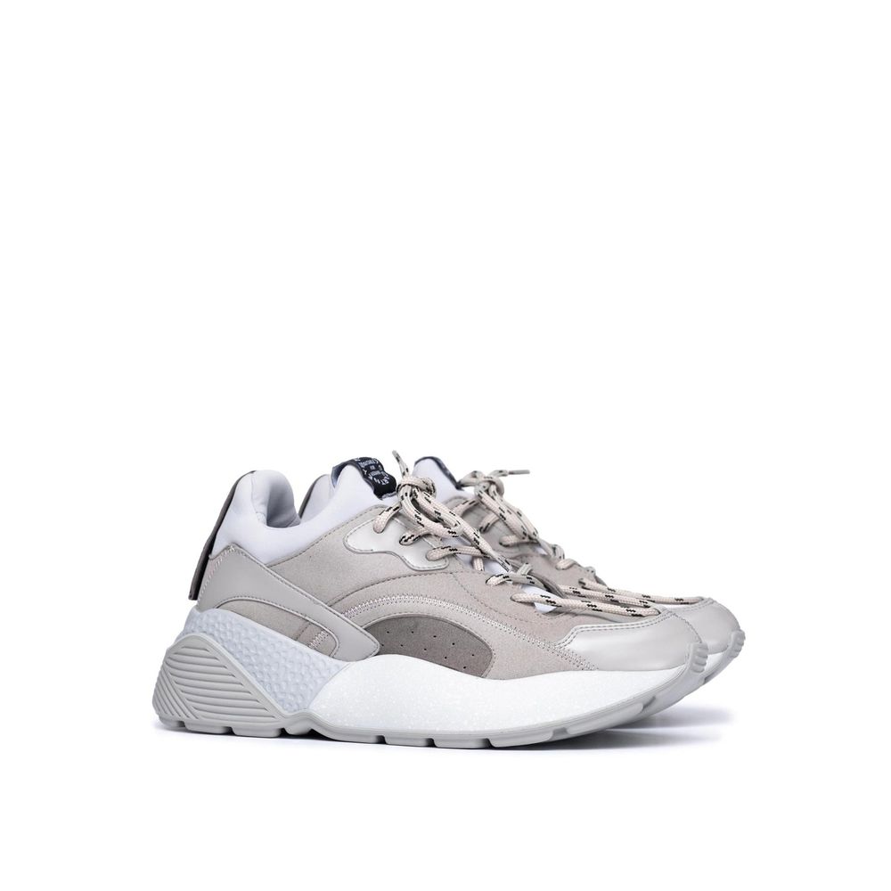 Stella McCartney Graue Sneaker aus veganem Leder mit klobiger Sohle
