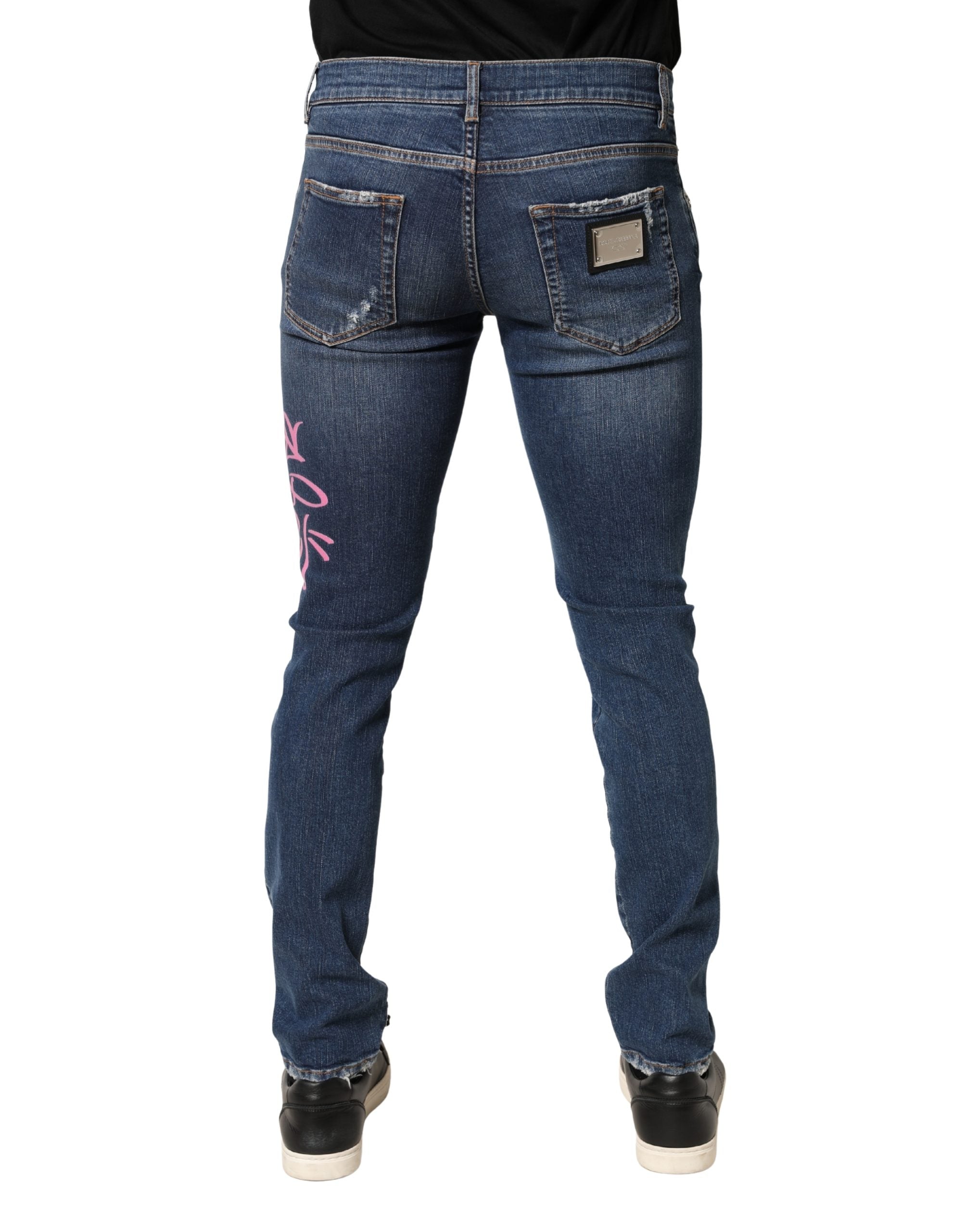 Dolce & Gabbana Blaue Skinny Jeans mit Distressed Graffiti-Print