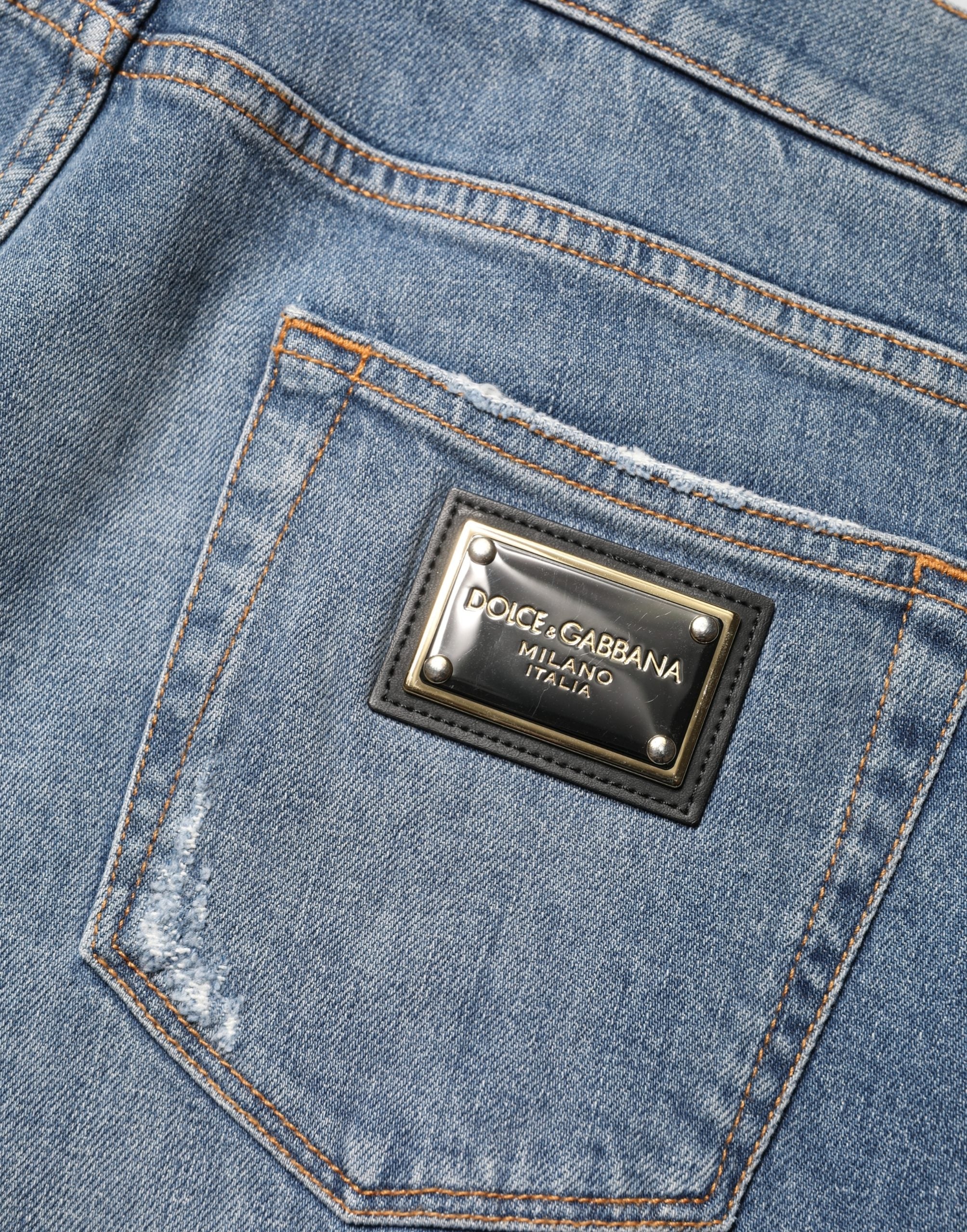 Dolce & Gabbana Blaue zerrissene Slim Fit Jeans aus Baumwolldenim