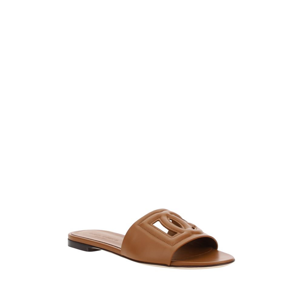 Dolce & Gabbana Braune Kalbsleder Bos Taurus Flache Sandalen