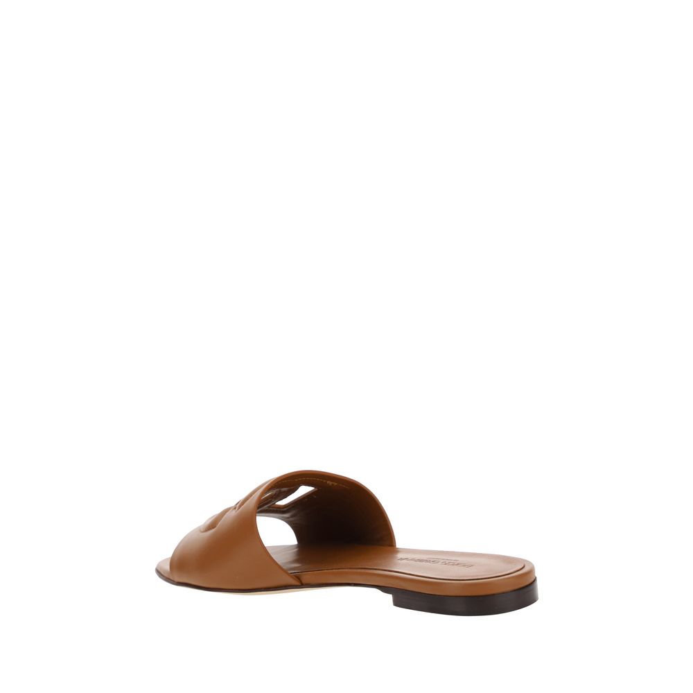 Dolce & Gabbana Braune Kalbsleder Bos Taurus Flache Sandalen