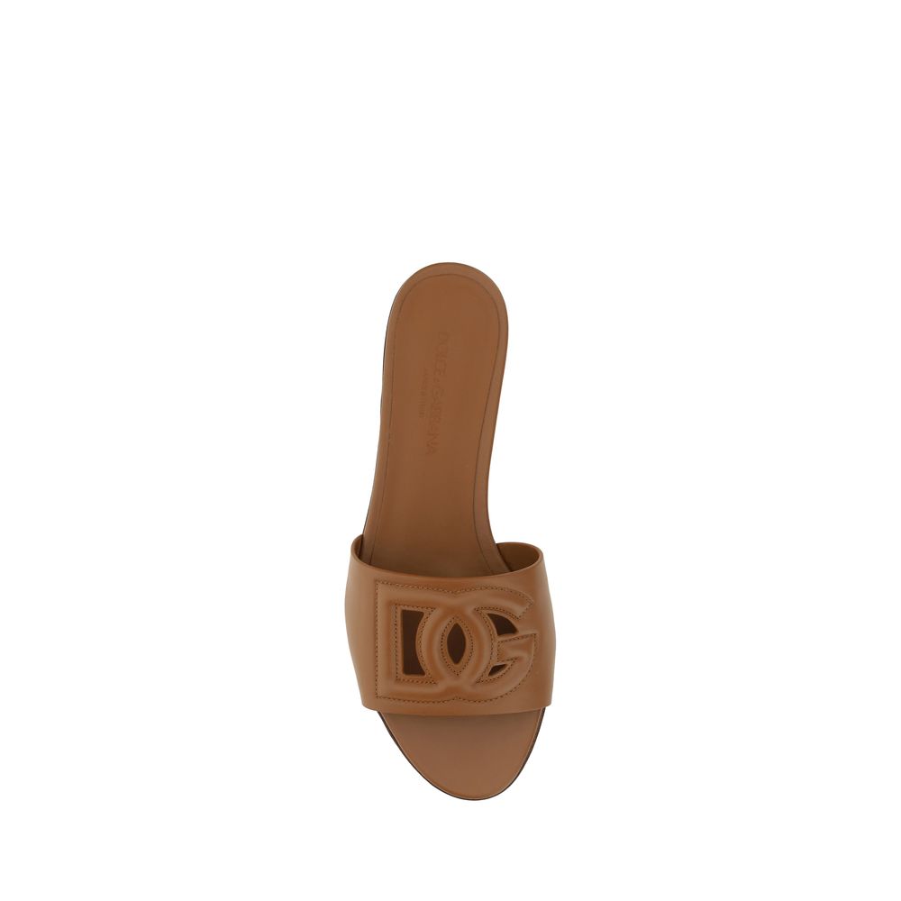 Dolce & Gabbana Braune Kalbsleder Bos Taurus Flache Sandalen