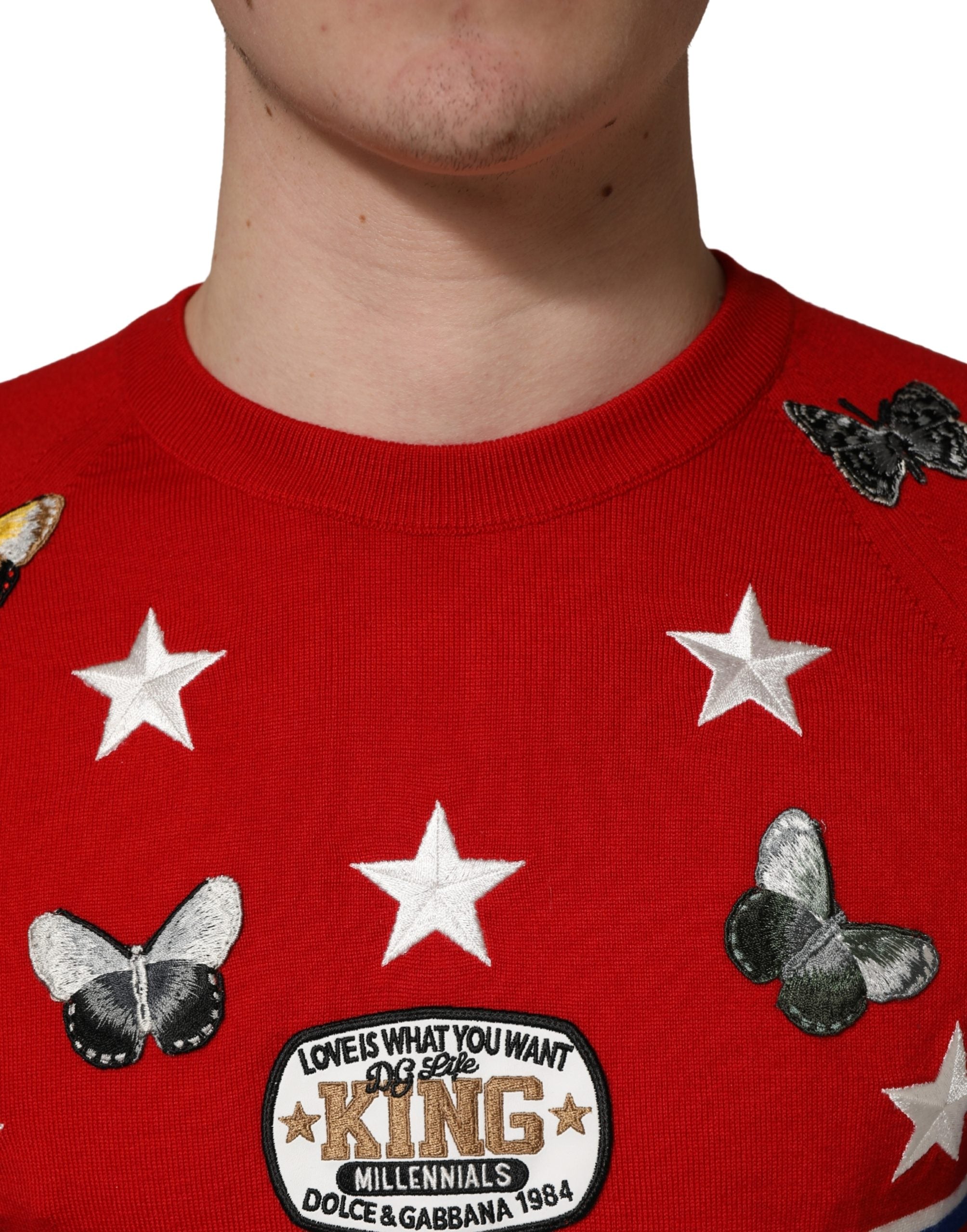 Dolce & Gabbana Pullover aus Wolle mit Schmetterlings- und Sternenmotiv, Rundhalsausschnitt