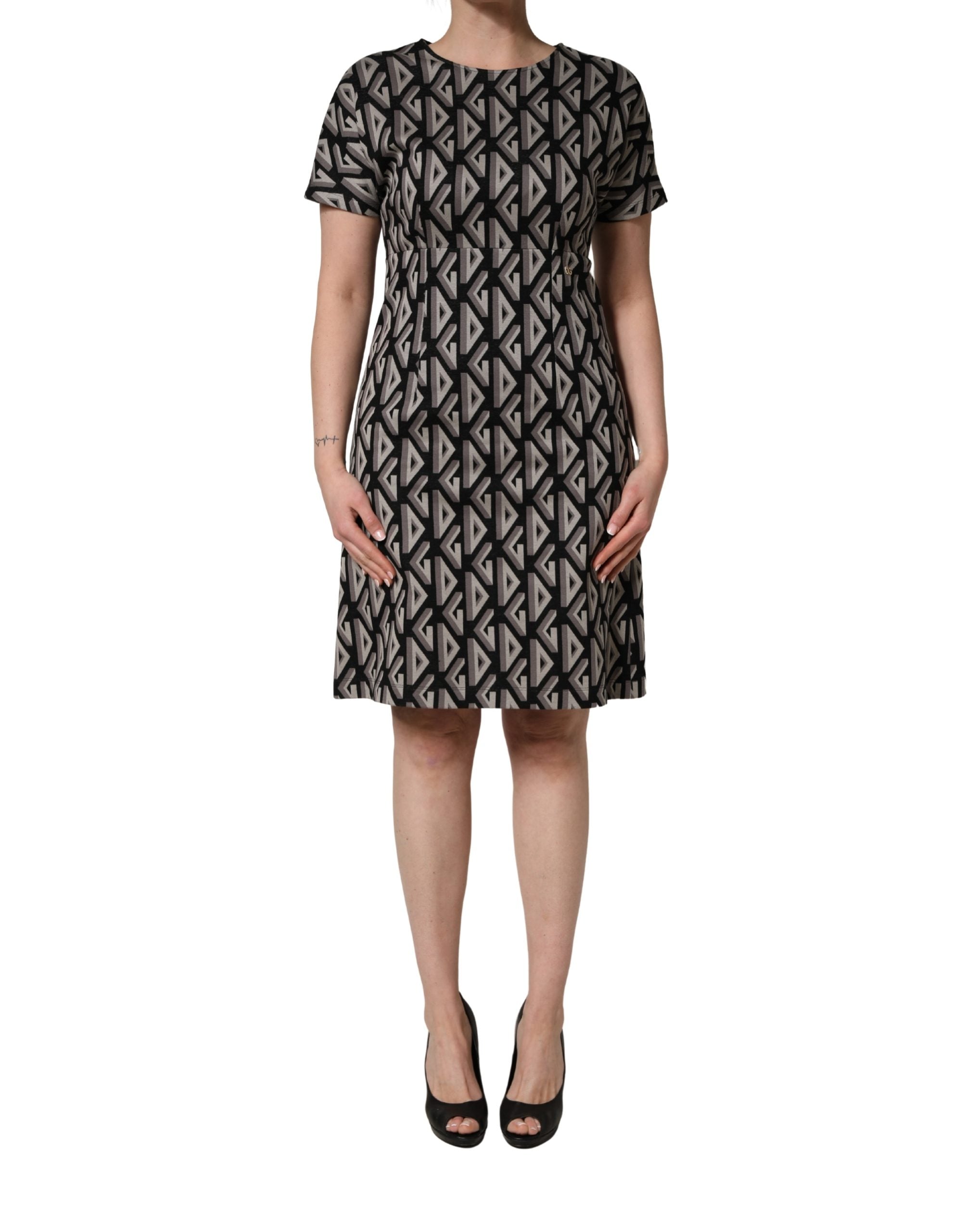 Dolce & Gabbana Schwarzes Kleid aus Baumwolle mit Logo-Print, knielang