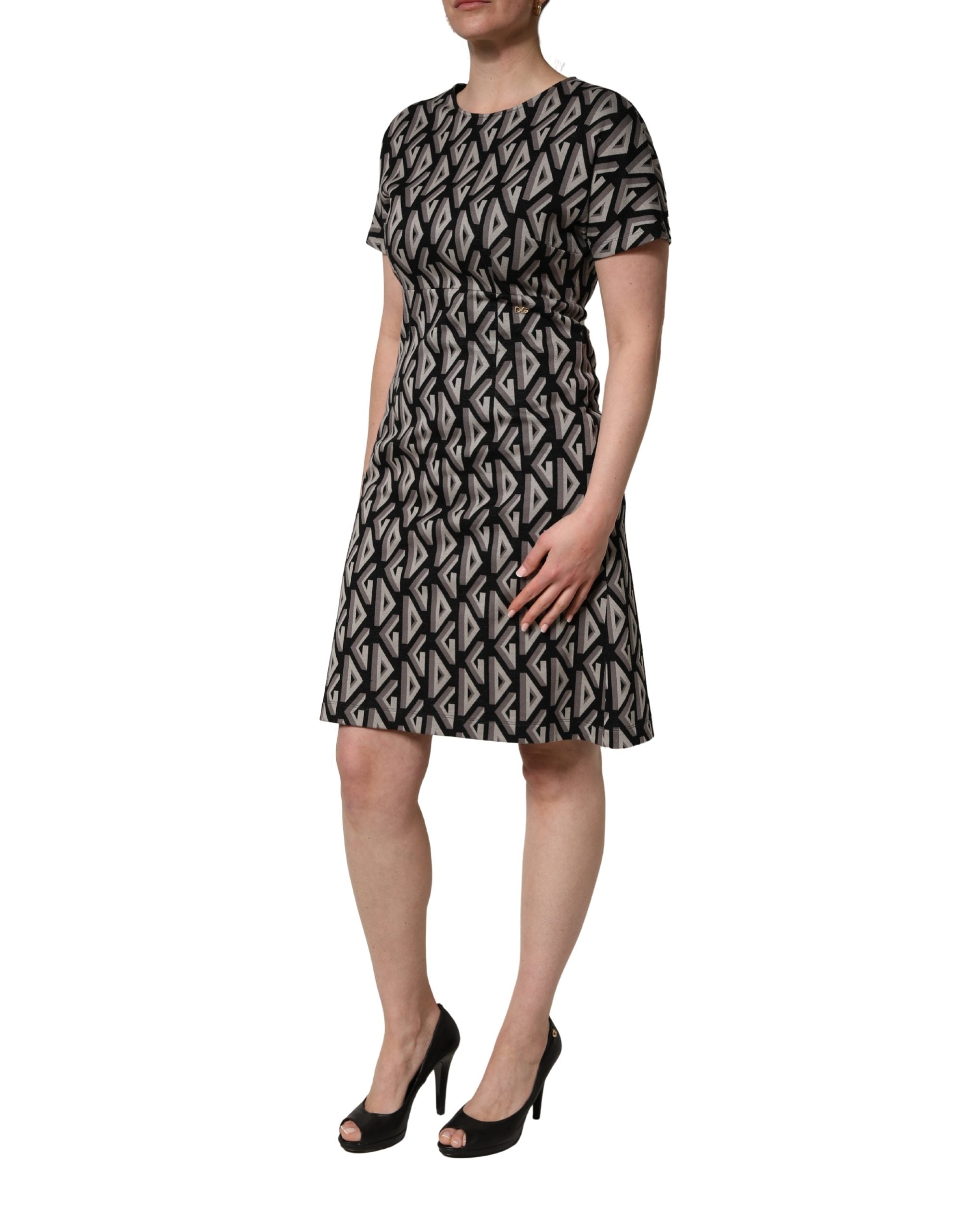 Dolce & Gabbana Schwarzes Kleid aus Baumwolle mit Logo-Print, knielang