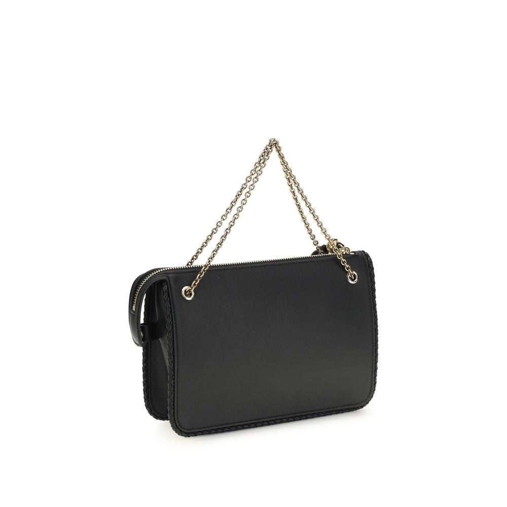Etro Schwarze Bos Taurus Kalbsleder Clutch