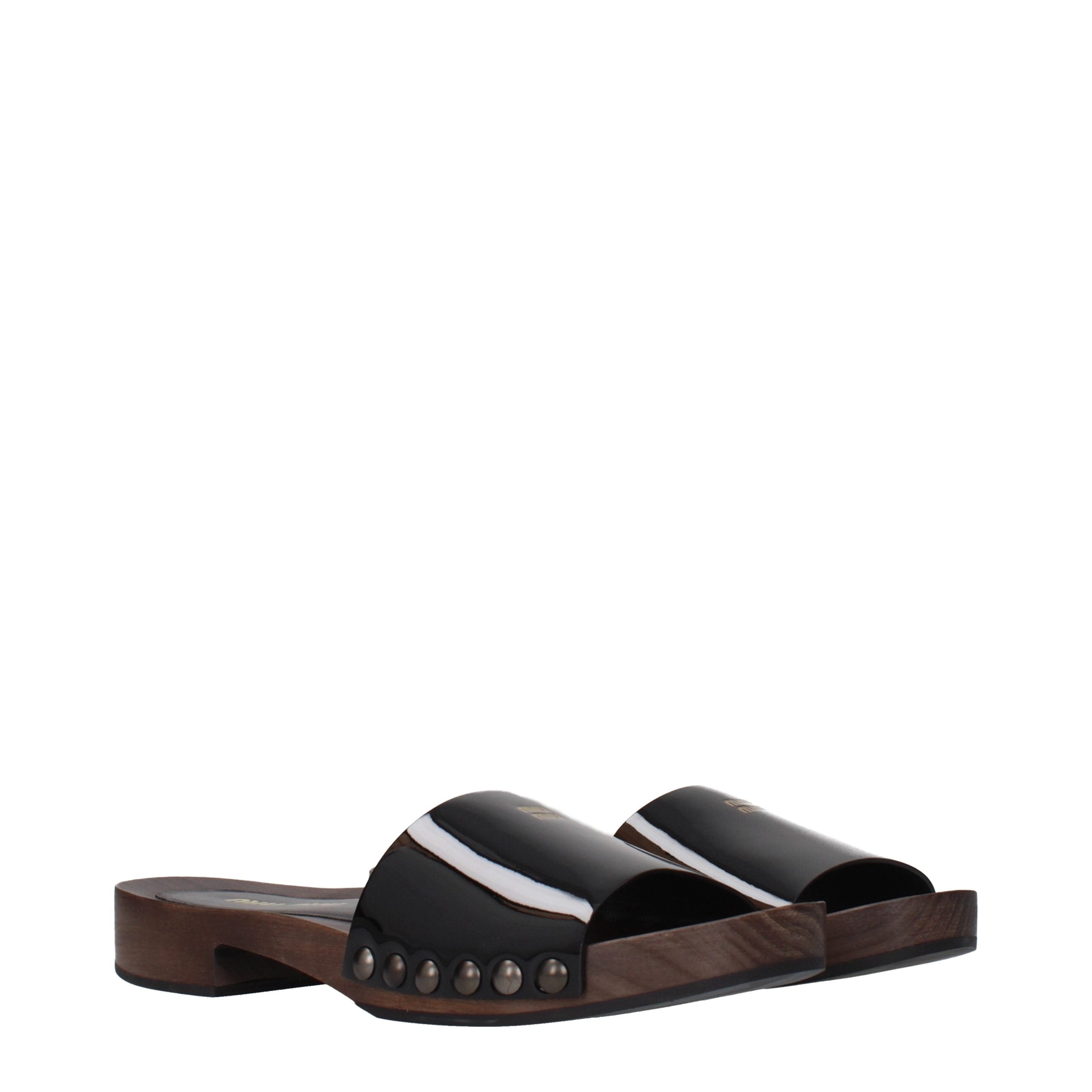 Miu Miu Schwarze Leder-Slipper