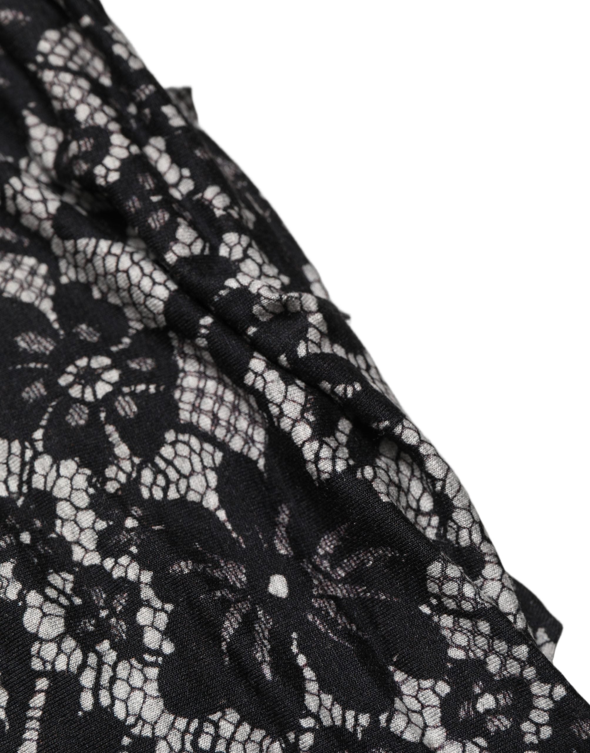 Dolce & Gabbana Ärmelloses Midikleid mit schwarzer und weißer Blumen-Spitze