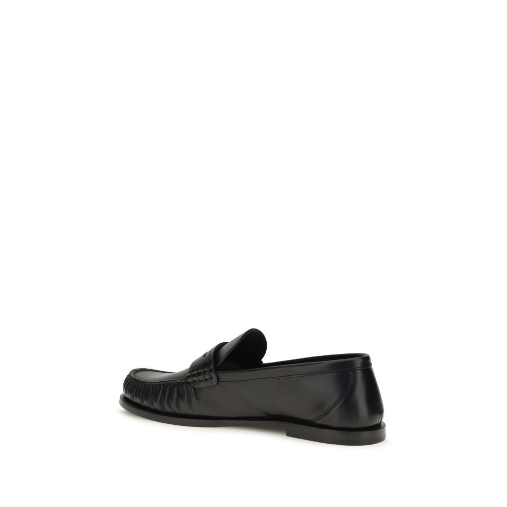 Saint Laurent Schwarze "Bos Taurus" Kalbsleder Loafer zum Hineinschlüpfen