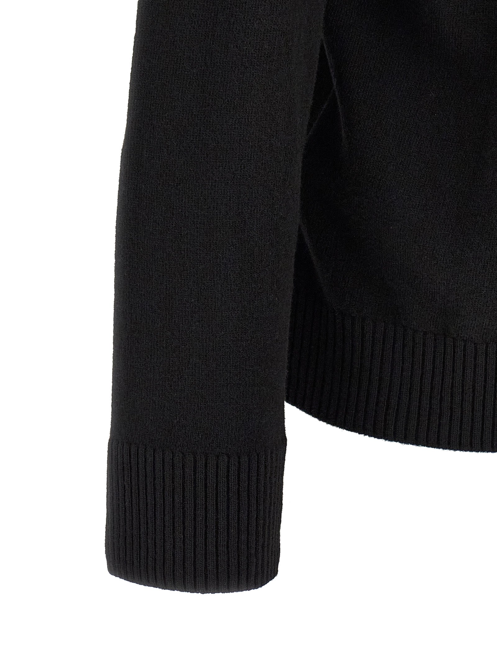 Stone Island Schwarzes Poloshirt aus reiner Schurwolle