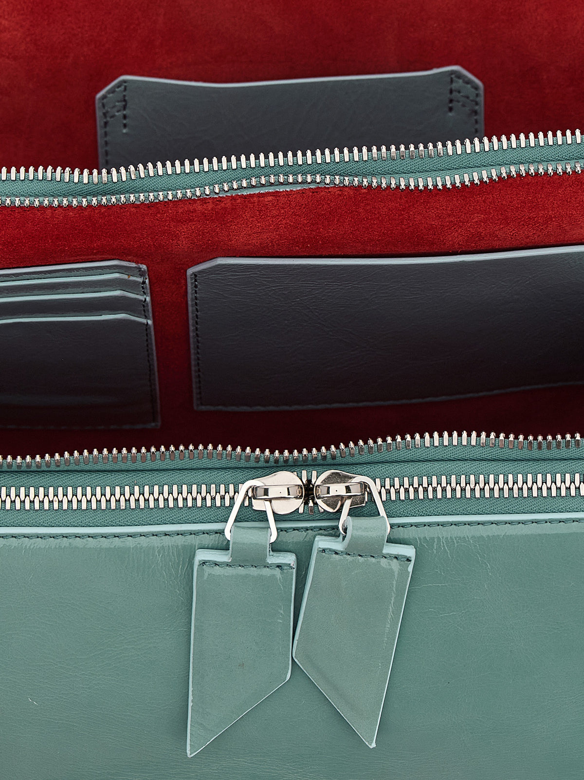 The Attico Schultertasche aus blauem Kalbsleder