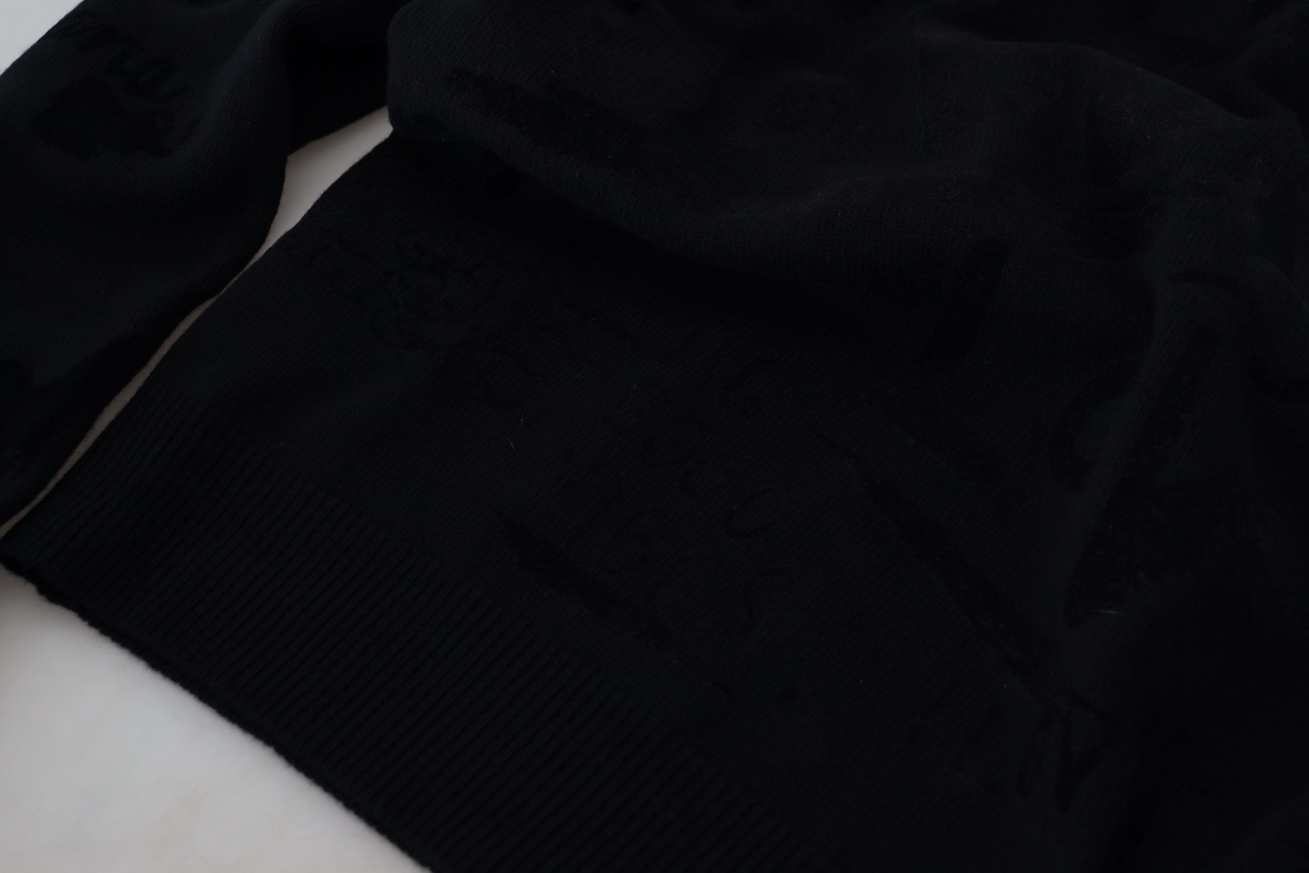 Dolce & Gabbana Schwarzer Wollpullover mit Logo-Muster und Rundhalsausschnitt