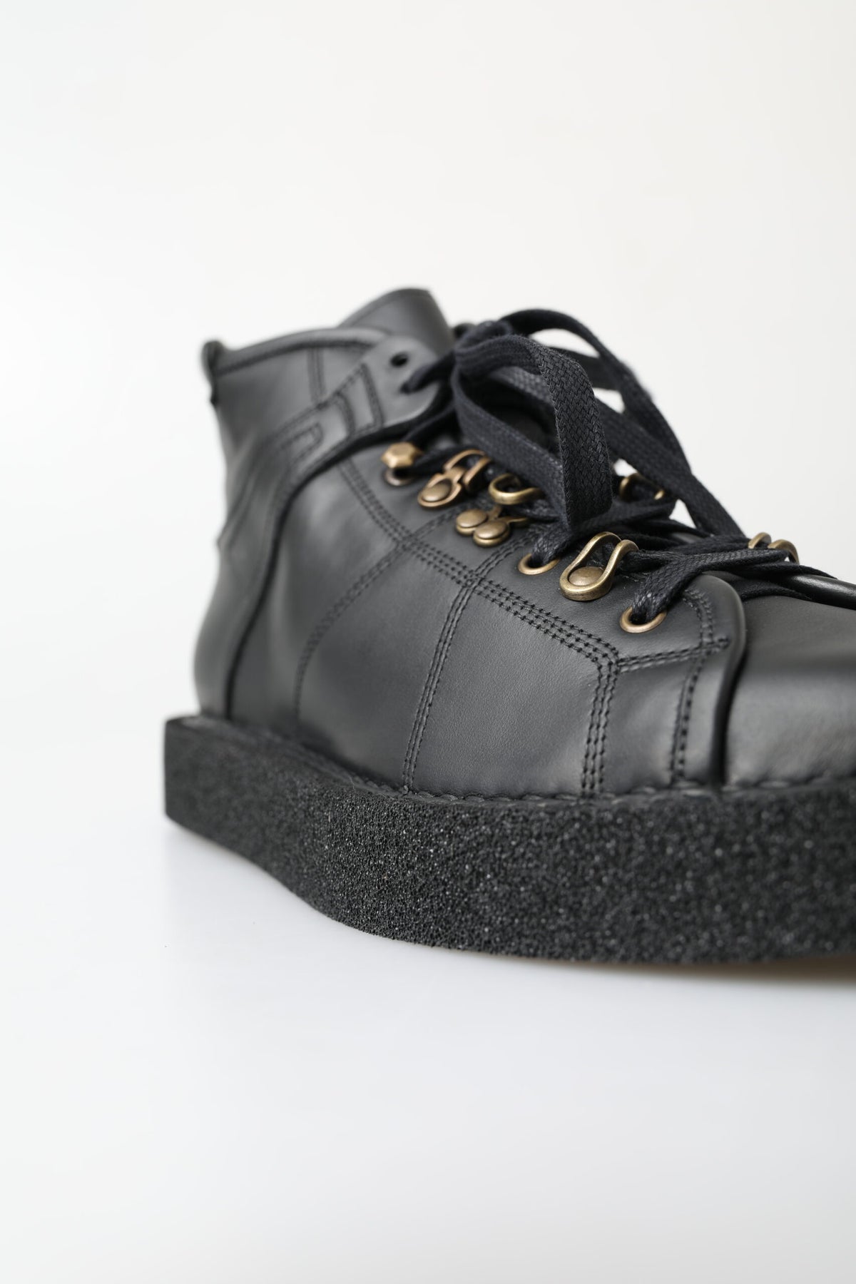 Dolce & Gabbana Schwarze Leder-Slipper mit Stretch-Stiefeln