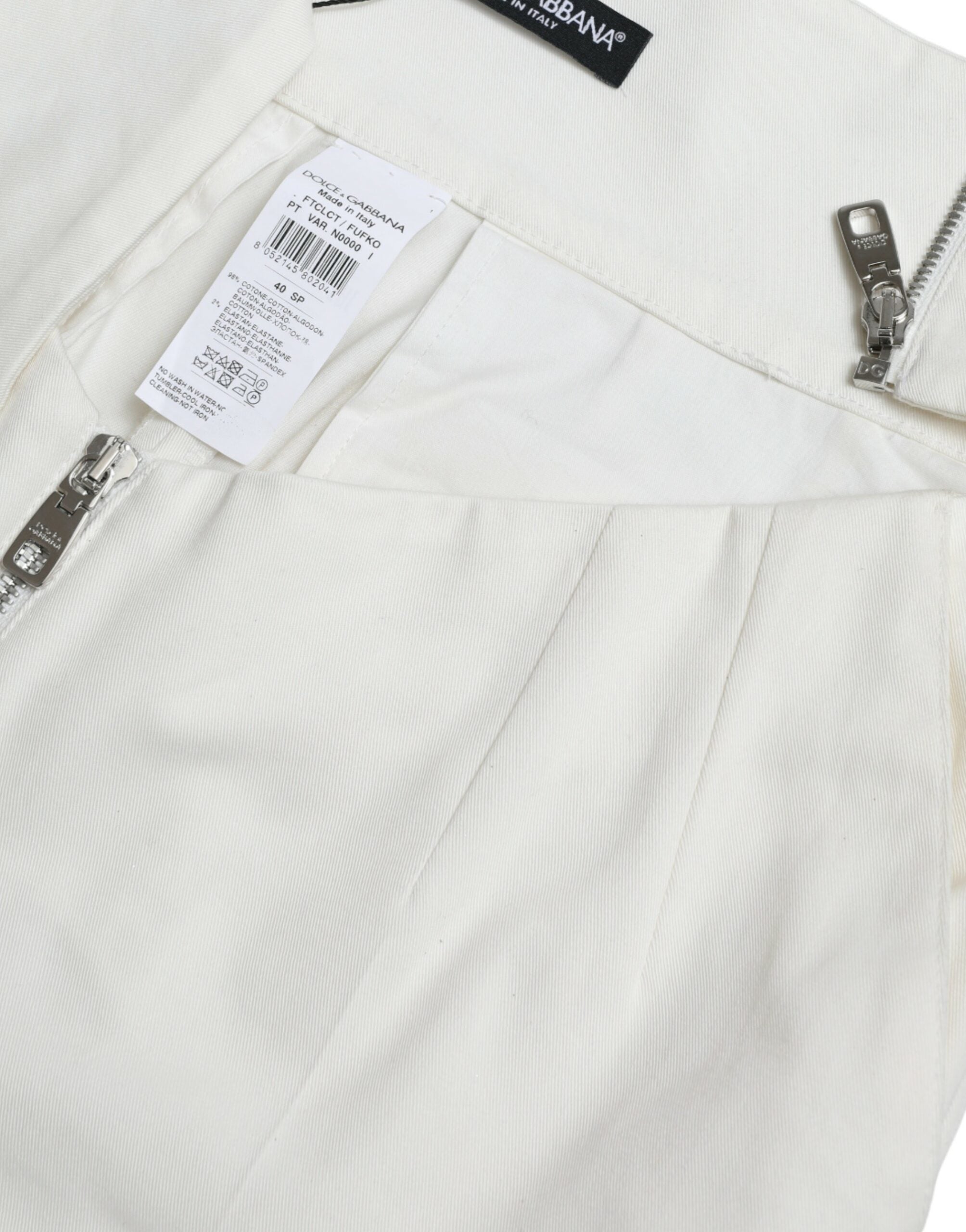 Dolce & Gabbana Schwarz-Weiß Baumwolle Cut Out Taille Tapered Pants