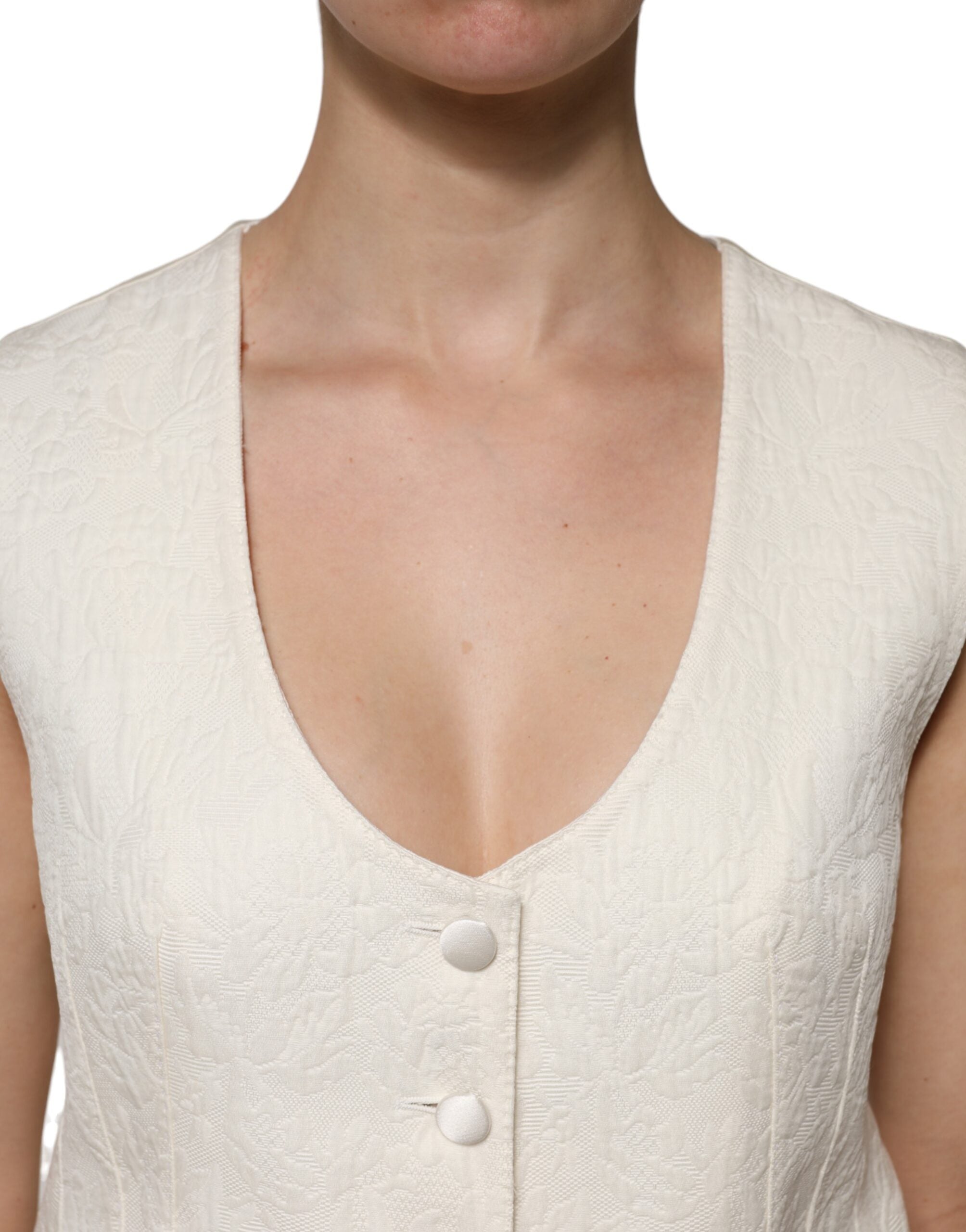 Dolce & Gabbana Elfenbeinfarbenes ärmelloses Weste Top mit Knopfleiste aus Baumwolle