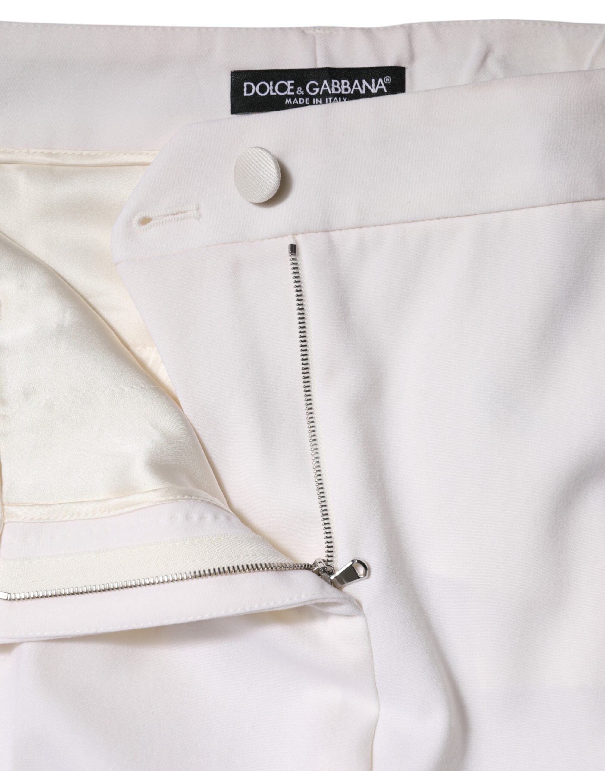 Dolce & Gabbana Weiße konisch zulaufende Hose aus Wolle mit mittlerer Taille