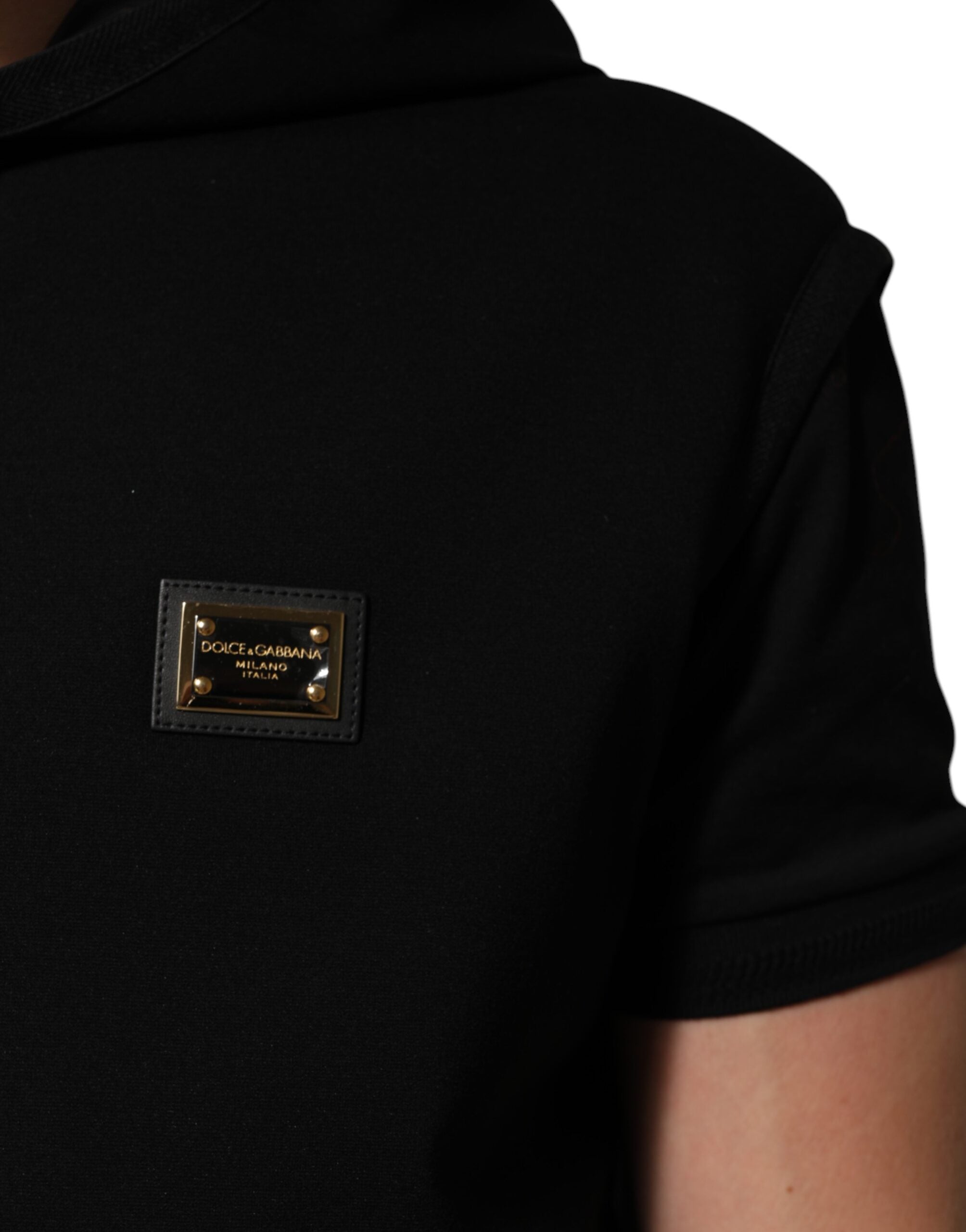 Dolce & Gabbana Schwarze ärmellose Jacke mit Kapuze und Logo-Plakette