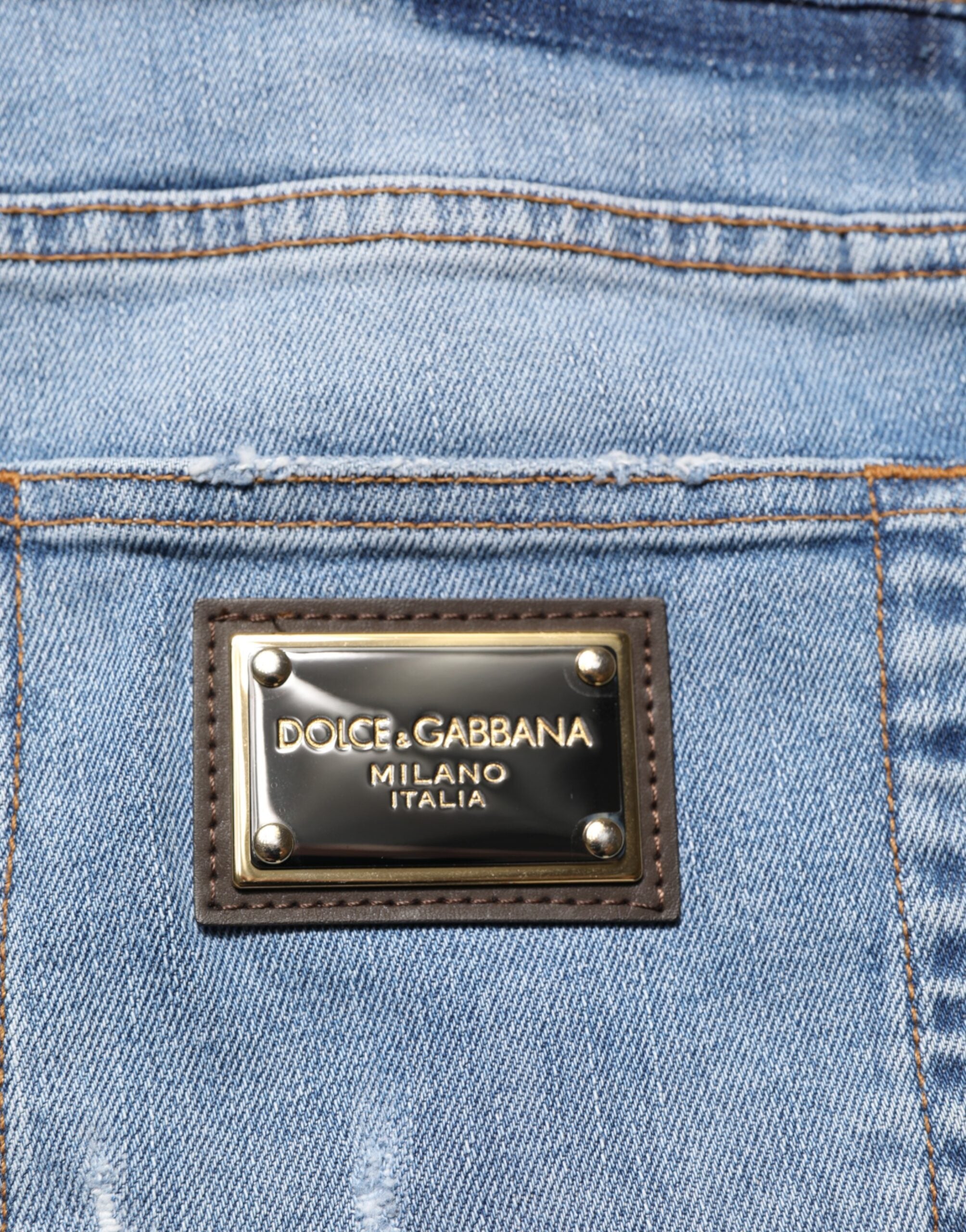 Dolce & Gabbana Blaue zerrissene Slim Fit Jeans aus Baumwolldenim