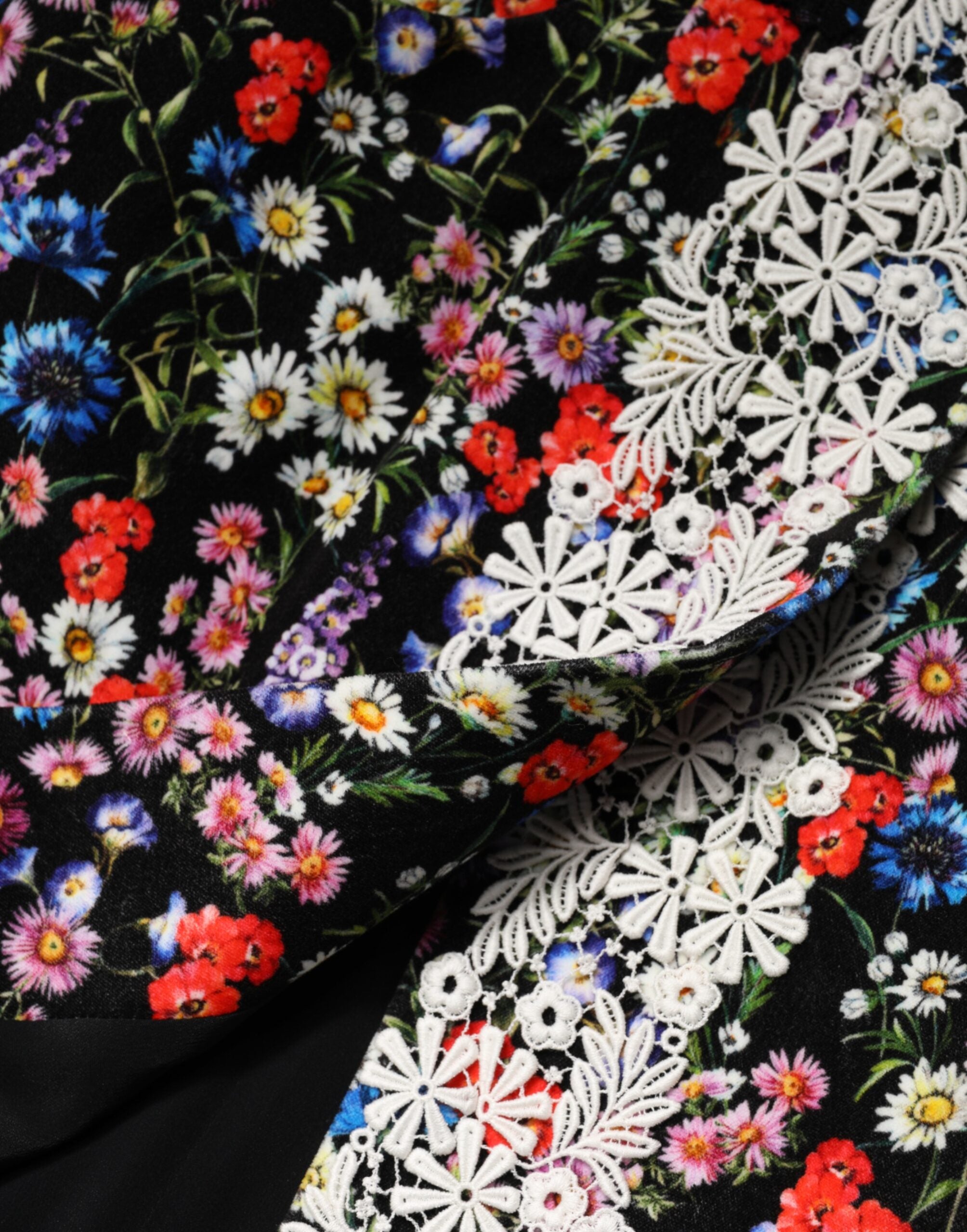 Dolce & Gabbana Schwarzer Minirock aus Baumwolle mit floraler Spitze