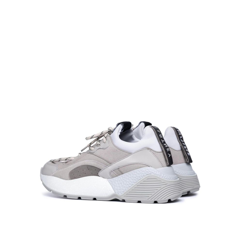 Stella McCartney Graue Sneaker aus veganem Leder mit klobiger Sohle