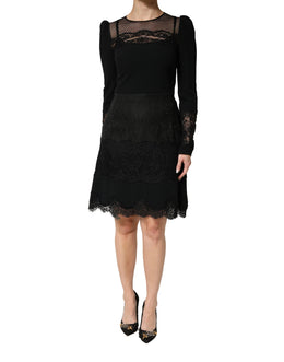 Dolce & Gabbana Schwarzes Spitzenkleid mit transparenten Einsätzen, Midi-Länge, langen Ärmeln