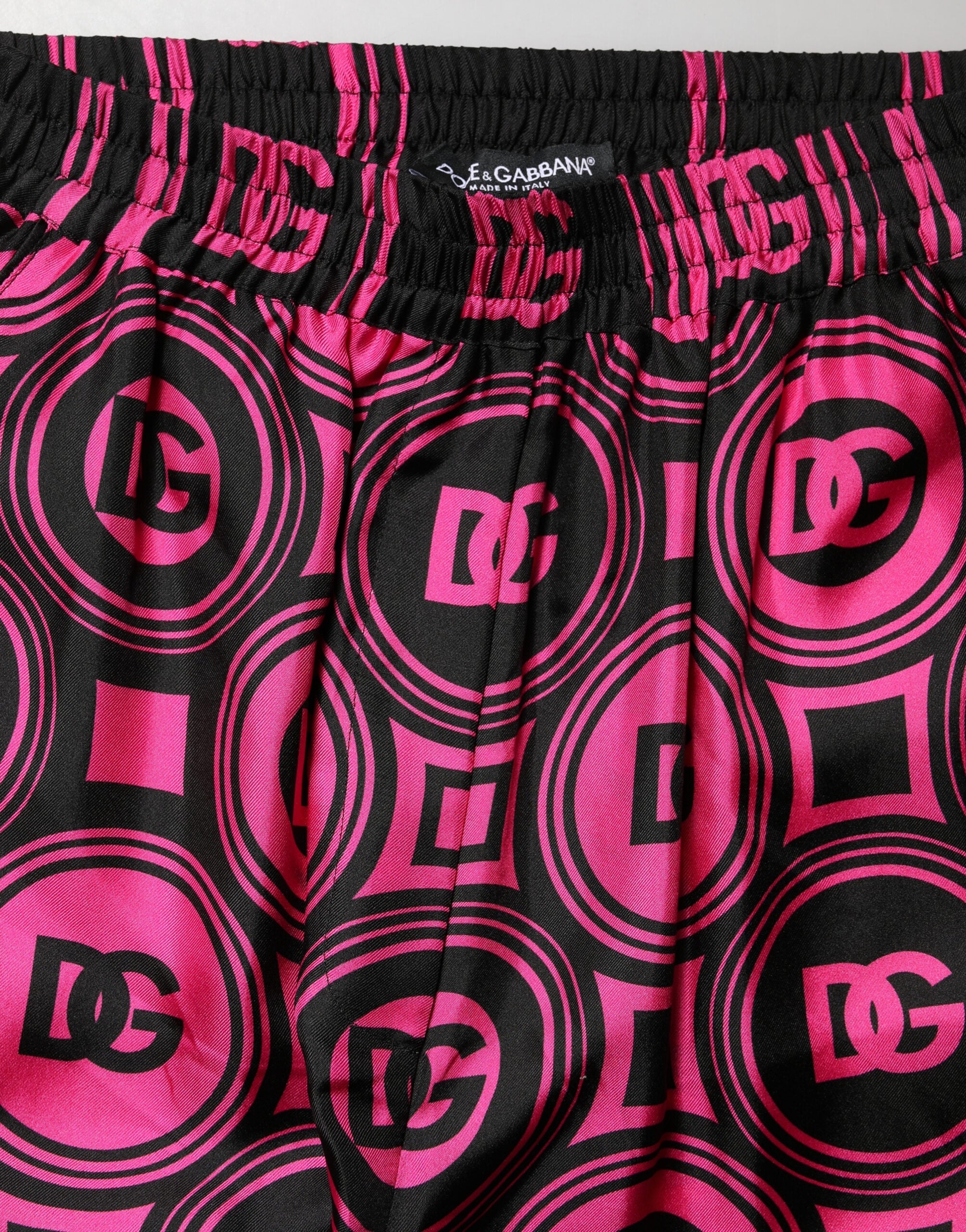 Dolce & Gabbana Schwarze Fuchsia-Seiden-Shorts mit Logo-Bund