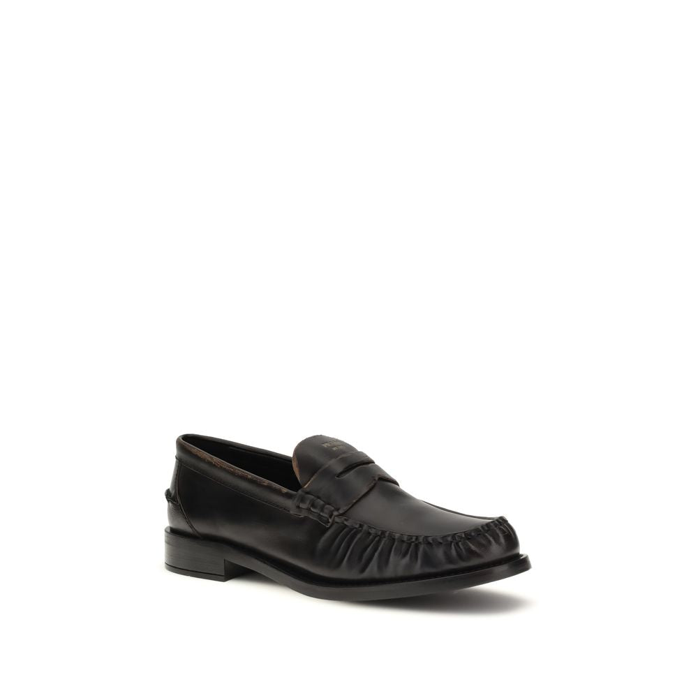 Prada Schwarze "Bos Taurus" Kalbsleder Loafer zum Hineinschlüpfen