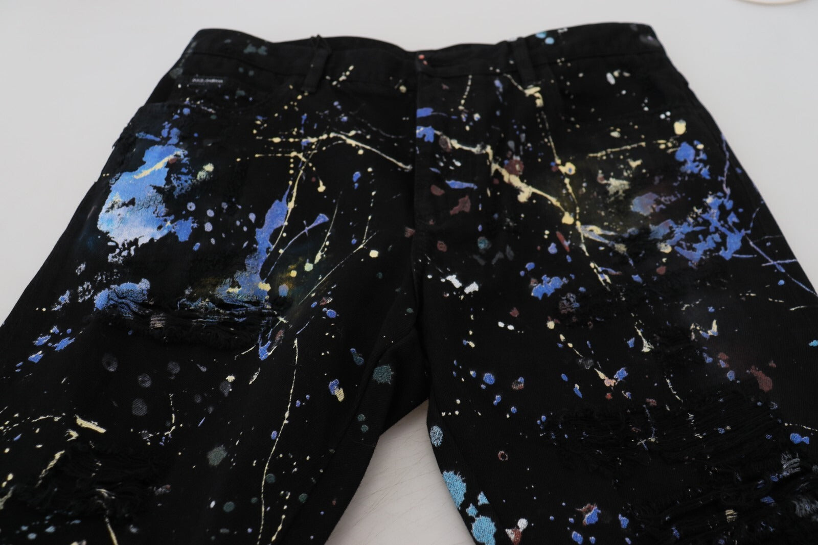 Dolce & Gabbana Schwarze Jeans aus Baumwolle mit Farbspritzer-Print