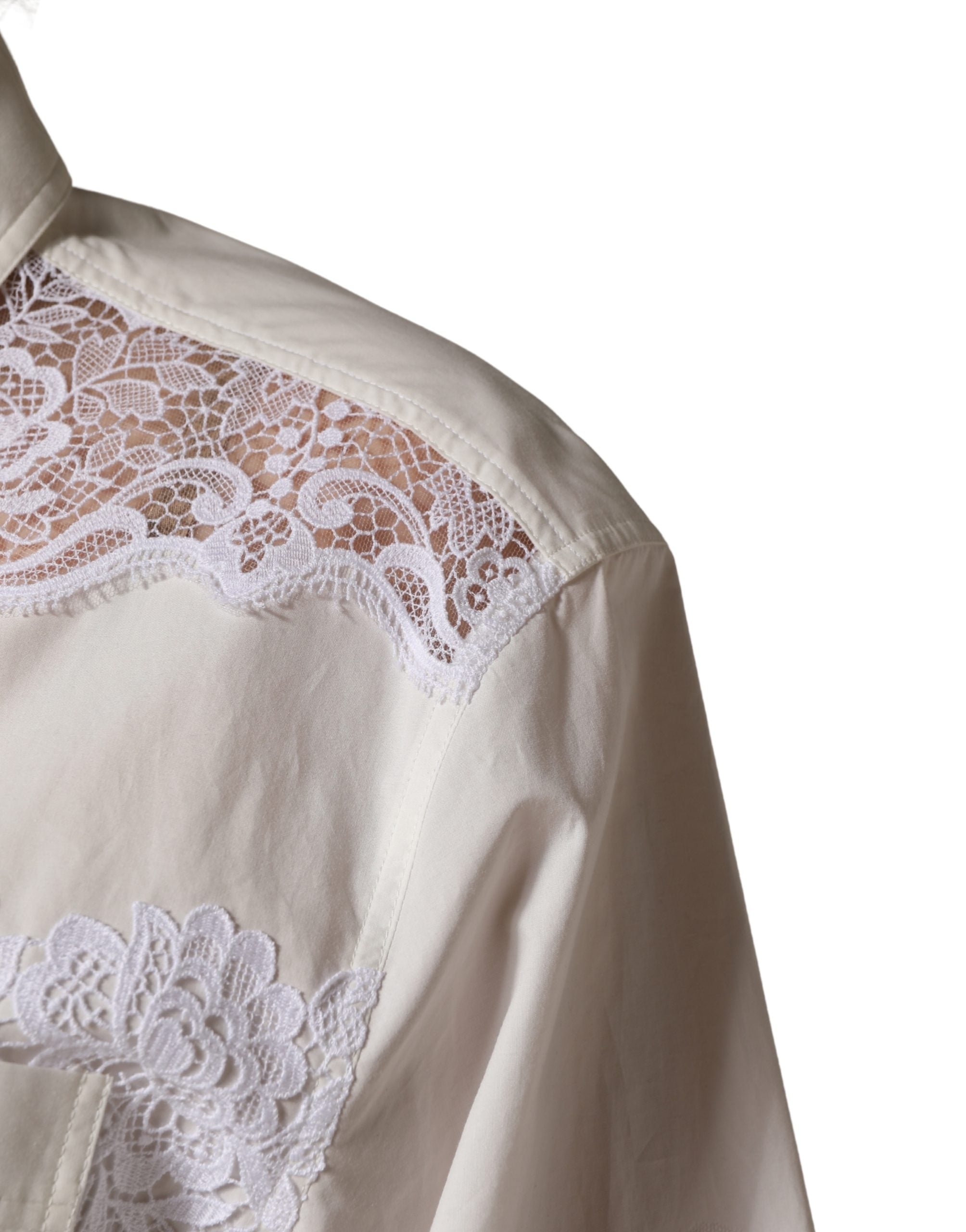 Dolce & Gabbana Jumpsuit aus weißer Baumwolle mit Spitzendetails und langen Ärmeln
