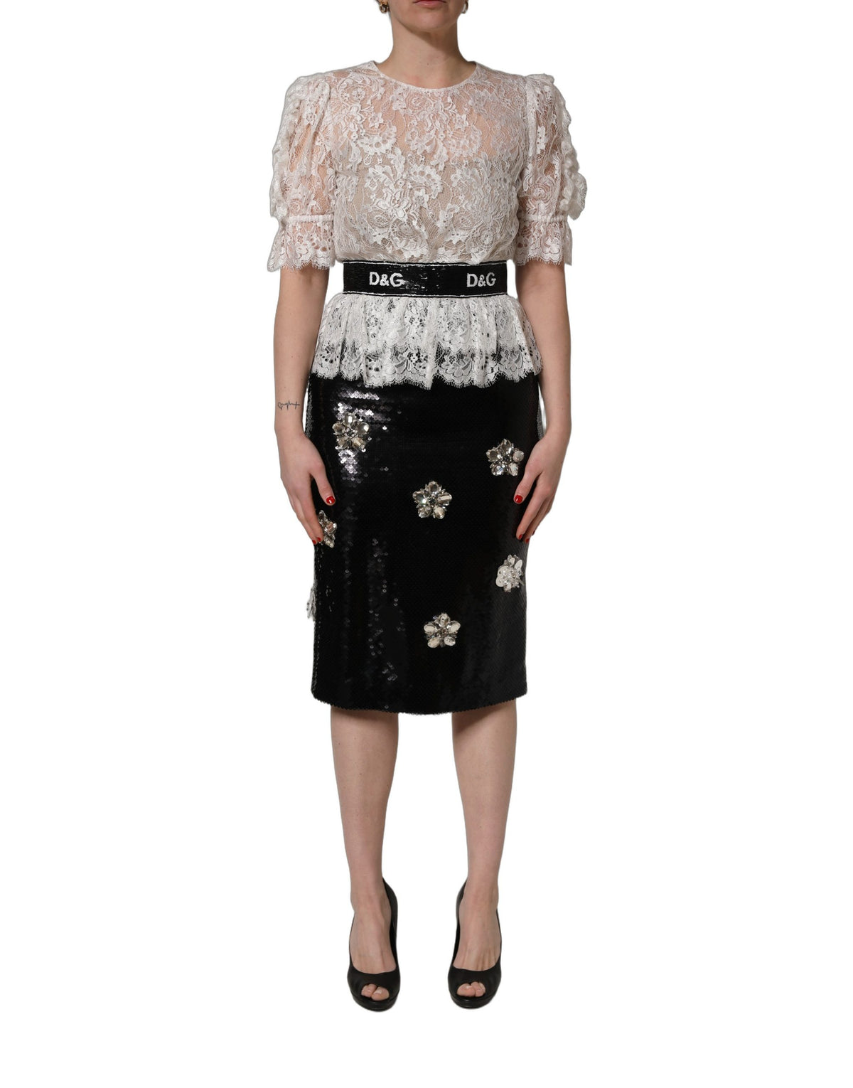 Dolce & Gabbana Kleid aus weißer Spitze mit schwarzem Rock und Verzierungen