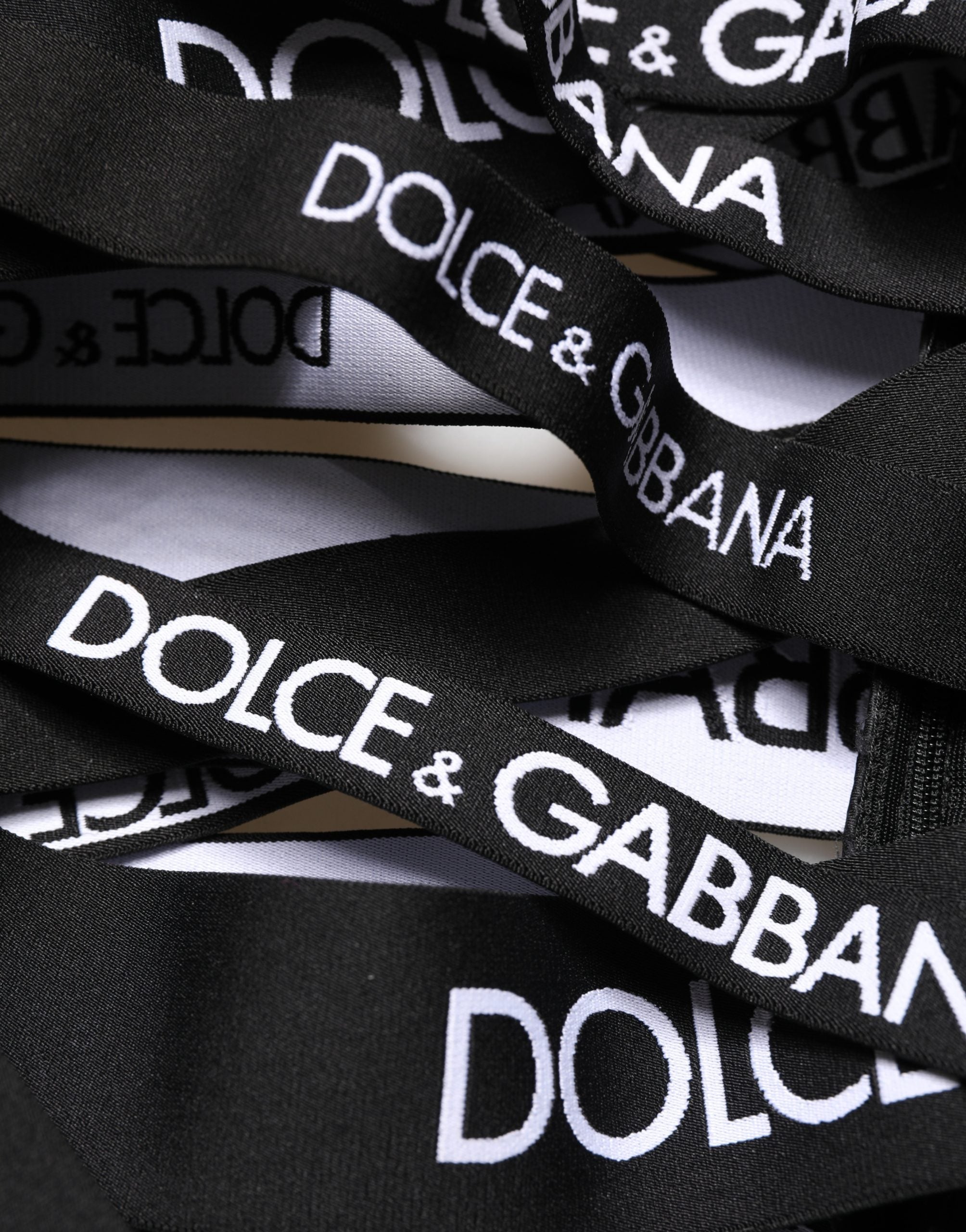 Dolce & Gabbana Schwarze Skinny High Waist Hose mit Logo-Tape und Cut-Out-Details