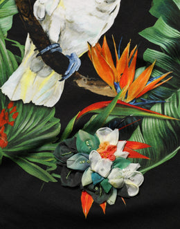 Dolce & Gabbana Schwarzes Baumwoll-T-Shirt mit tropischem Print und Rundhalsausschnitt