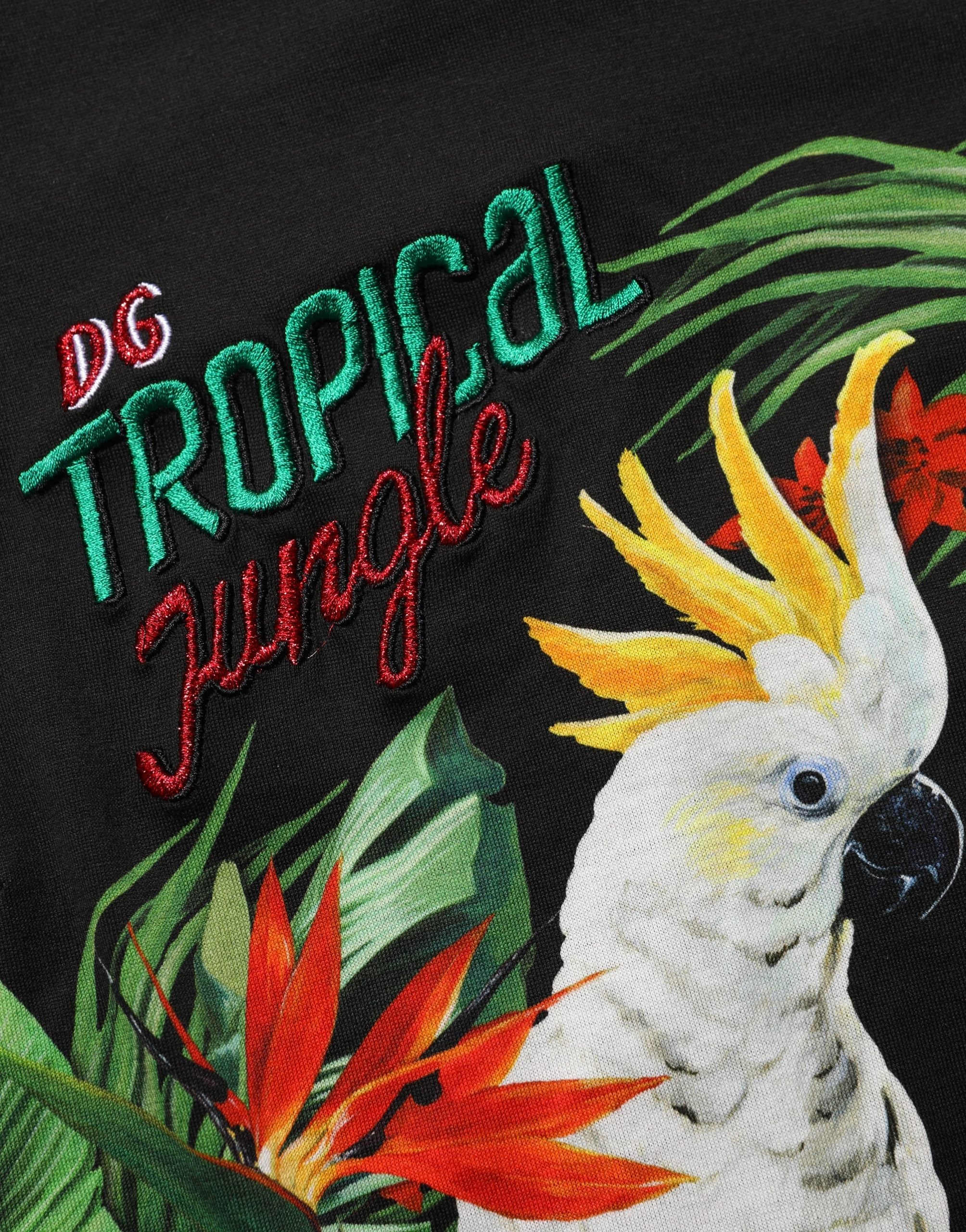Dolce & Gabbana Schwarzes Baumwoll-T-Shirt mit tropischem Print und Rundhalsausschnitt