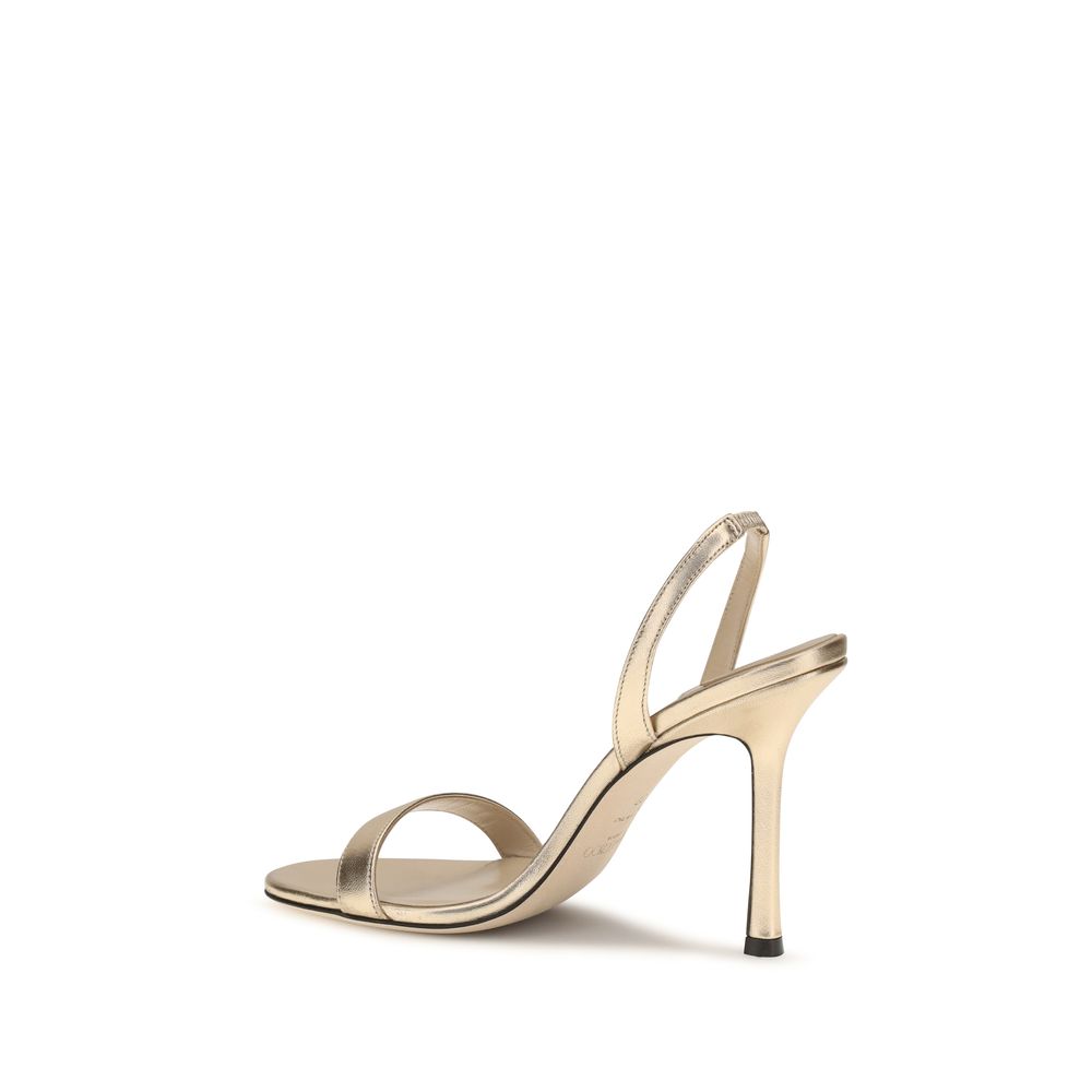 Jimmy Choo Sandale mit Stiletto-Absatz aus Kalbsleder Bos Taurus in Gold