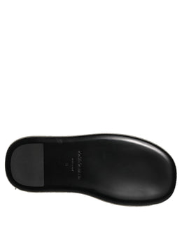 Dolce & Gabbana Schwarze Plateau-Slipper für Herren mit Kristallbesatz