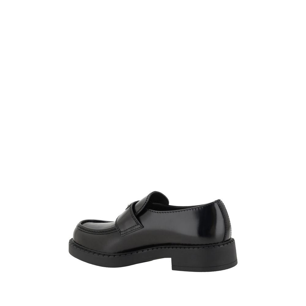 Prada Schwarze Bos Taurus Kalbsleder Plateau-Loafer