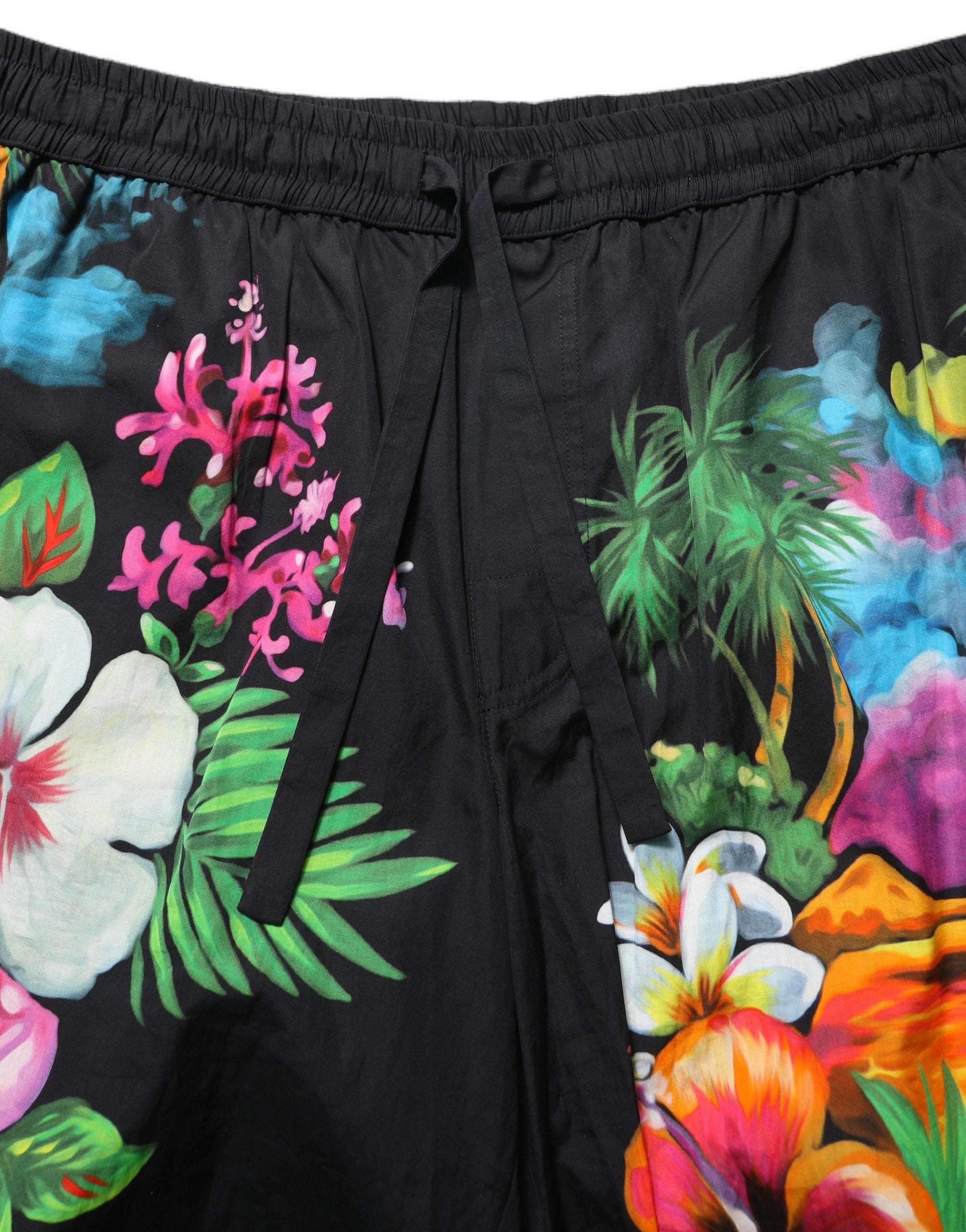 Dolce & Gabbana Schwarze Bermuda-Shorts aus Baumwolle mit tropischem Blumenmuster