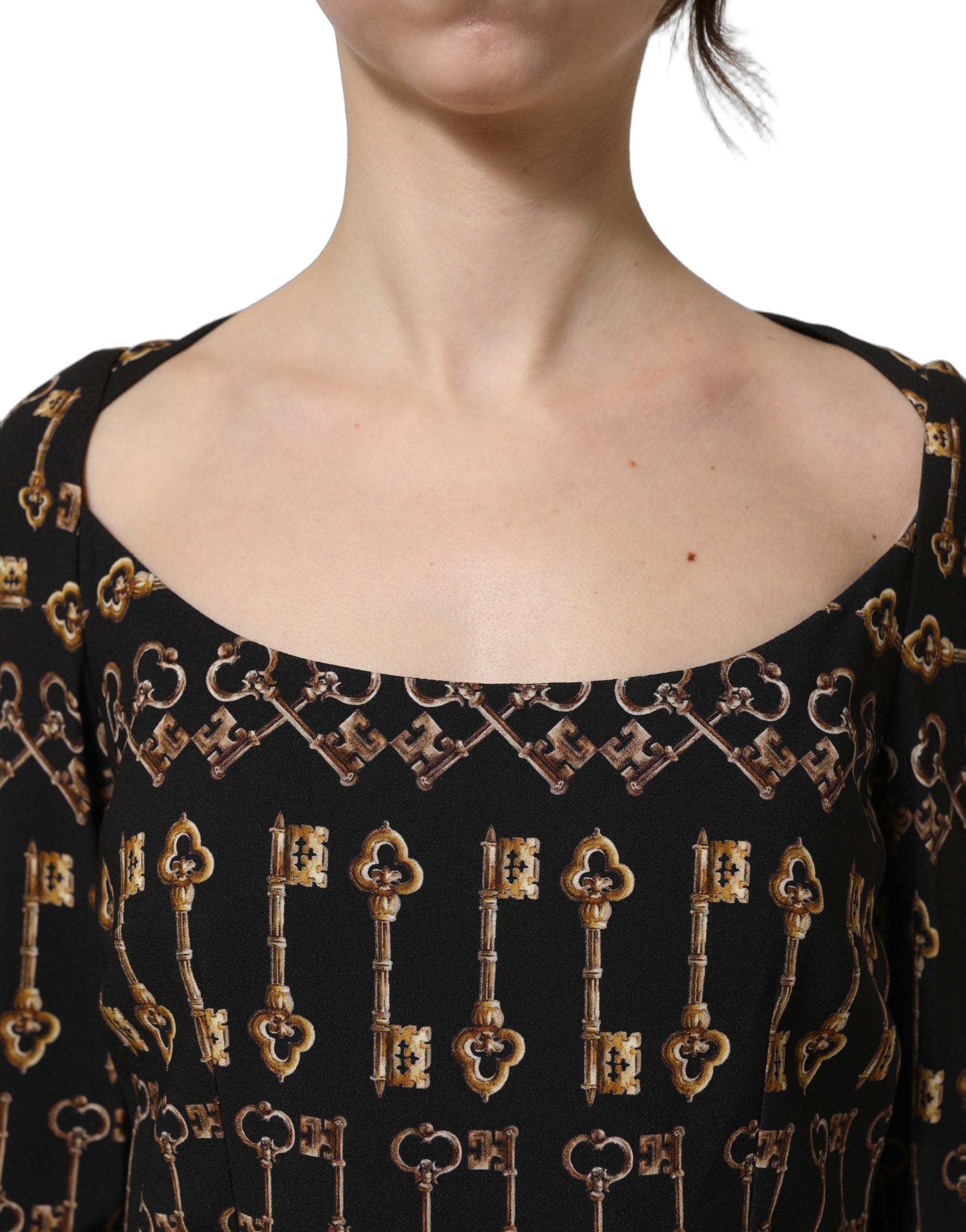 Dolce & Gabbana Schwarzes Etuikleid mit langem Arm und Schlüssel-Print