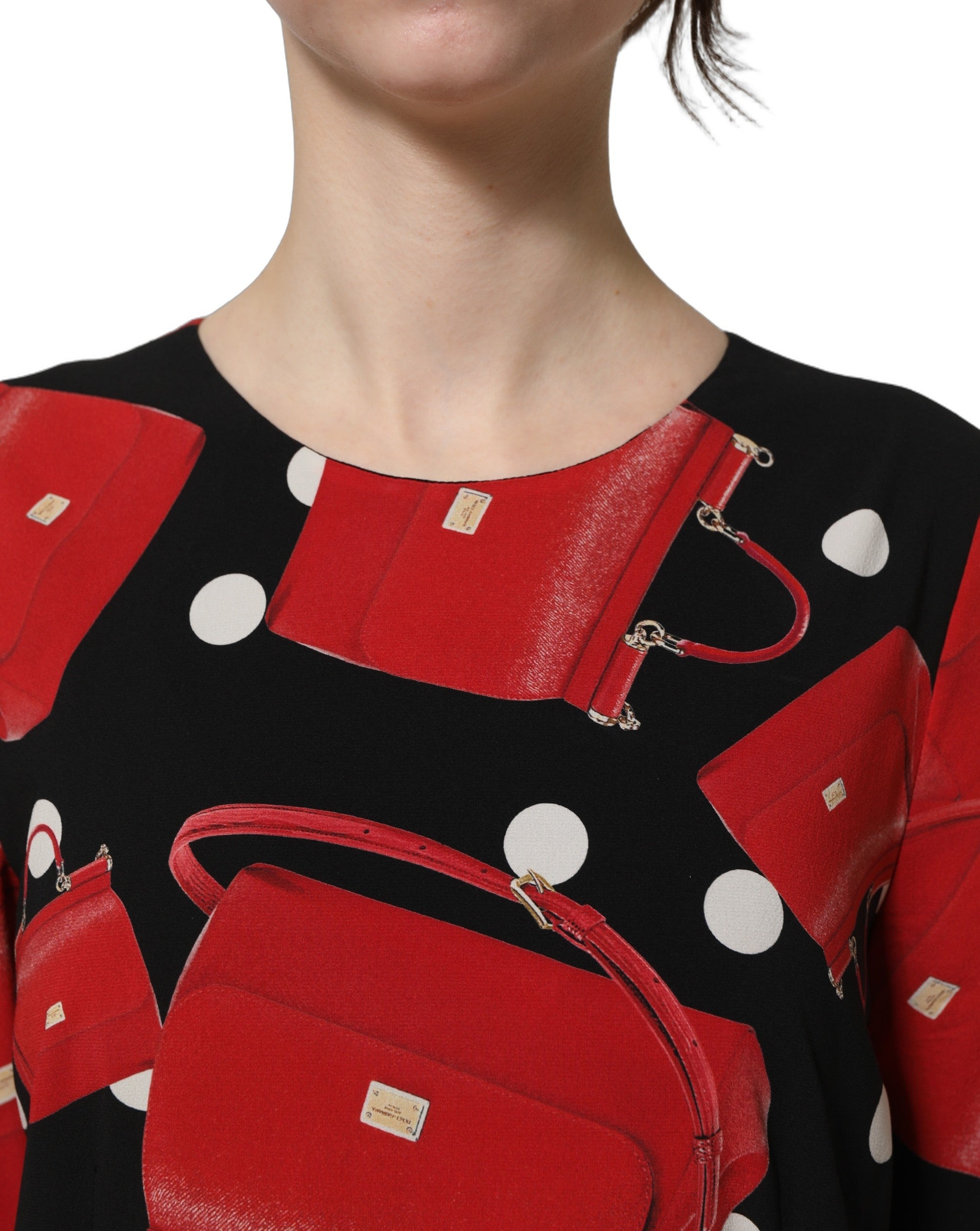 Dolce & Gabbana Schwarzes Midikleid mit Langarm und Handtaschen-Print
