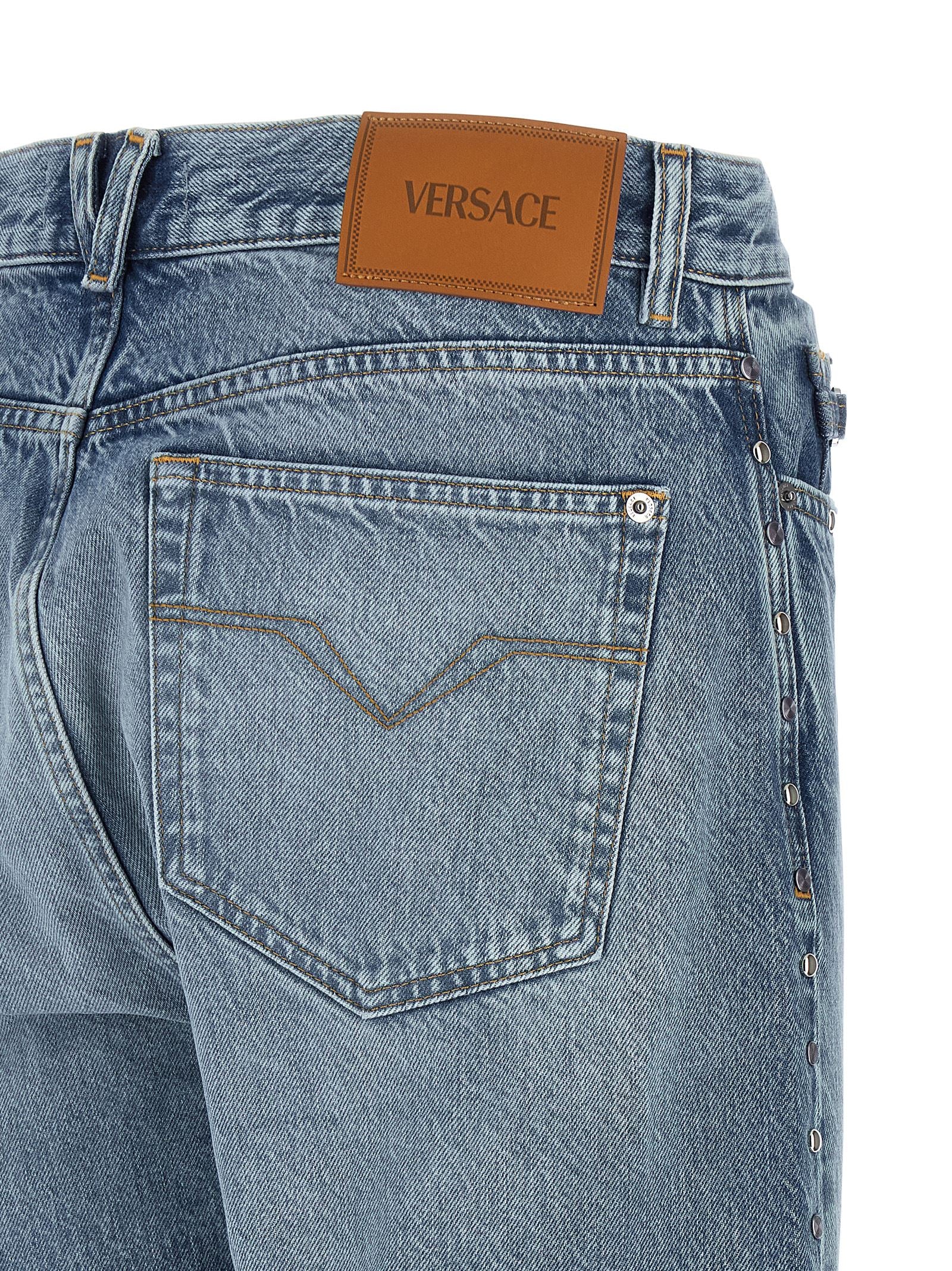 Versace Blaue Jeans aus Baumwolle im geraden Schnitt