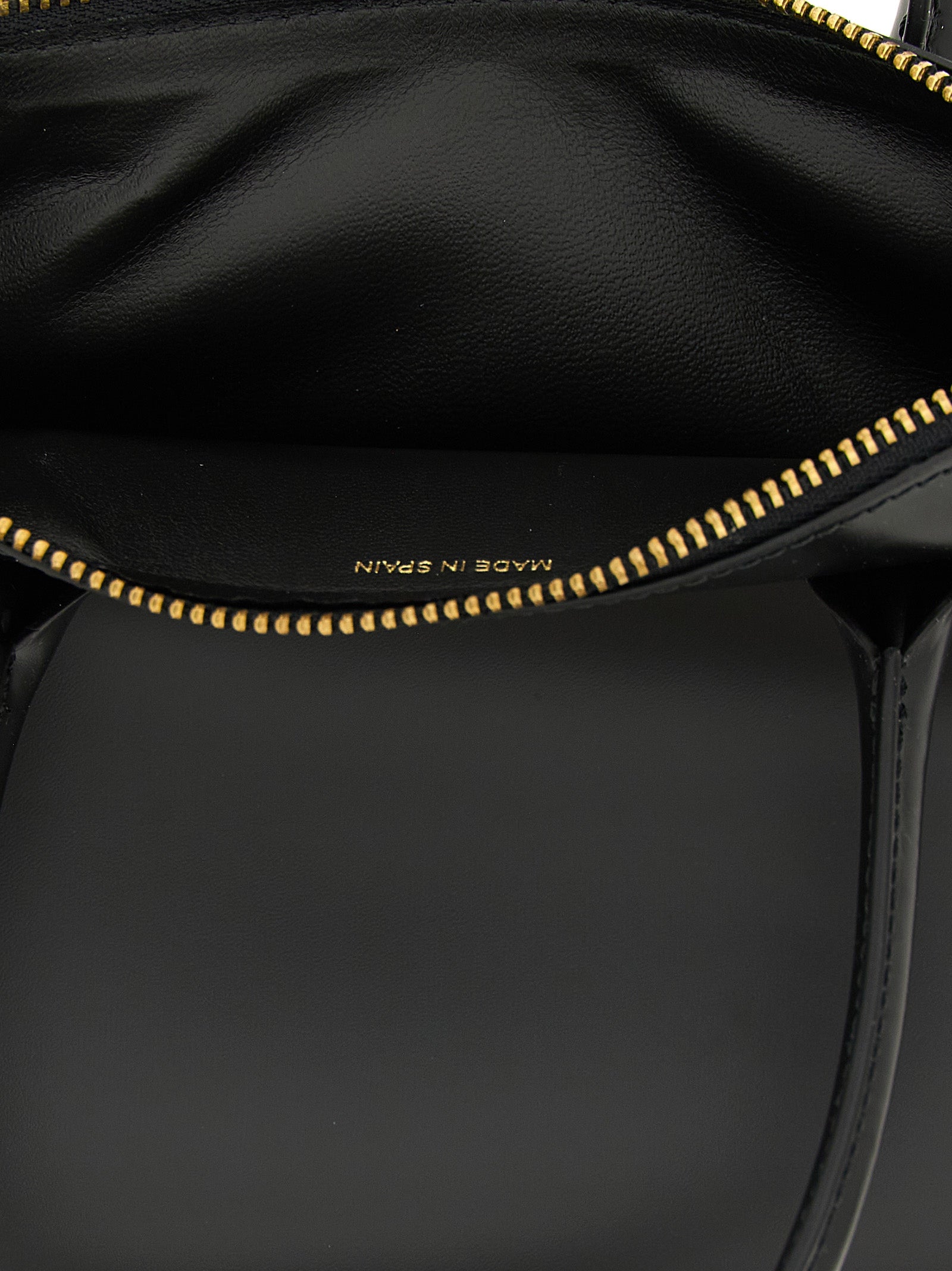 Comme Des Garçons Schwarze Kalbsleder-Handtasche