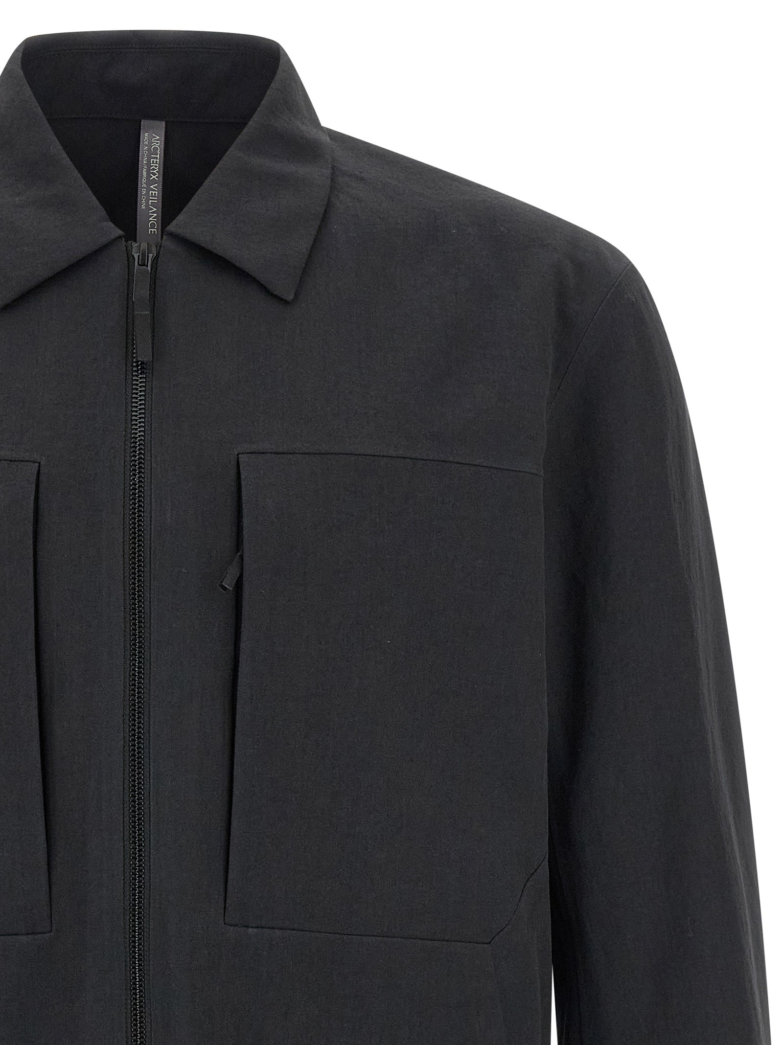 Arc'teryx Veilance Schwarze Bluse aus Polyester