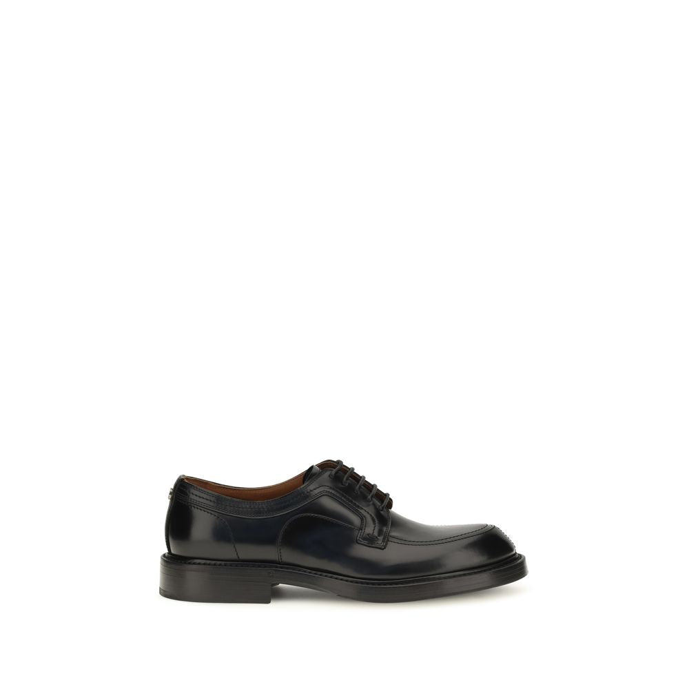 Dolce & Gabbana Schwarze Kalbsleder Bos Taurus Oxfords und Derbys