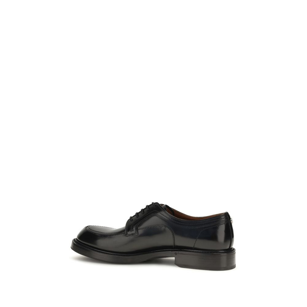 Dolce & Gabbana Schwarze Kalbsleder Bos Taurus Oxfords und Derbys