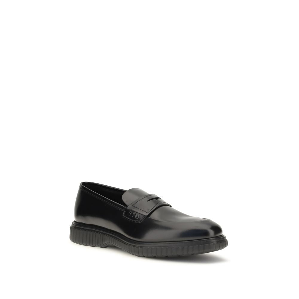 Ferragamo Schwarze "Bos Taurus" Kalbsleder Loafer zum Hineinschlüpfen