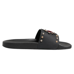 Dolce & Gabbana Schwarze Pantoletten aus Kalbsleder mit Herz-Patch