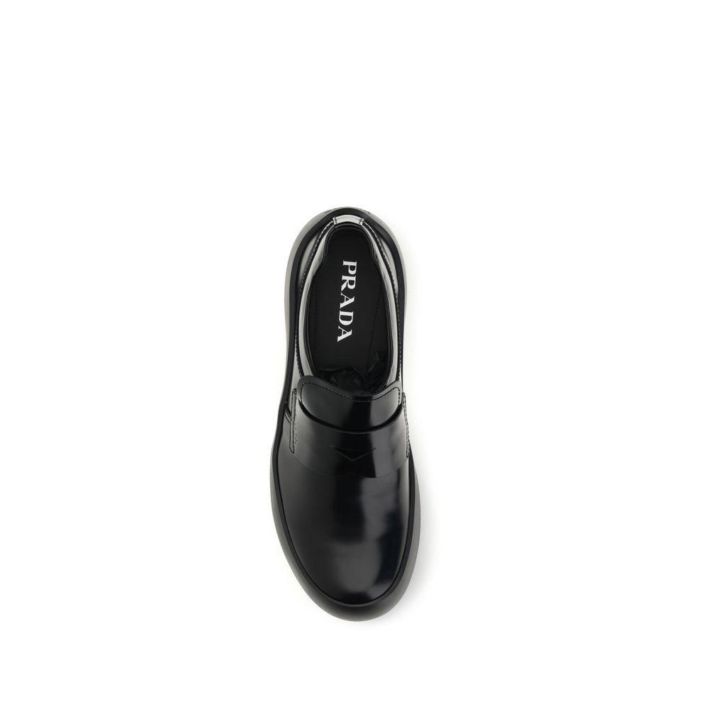 Prada Schwarze "Bos Taurus" Kalbsleder Loafer zum Hineinschlüpfen