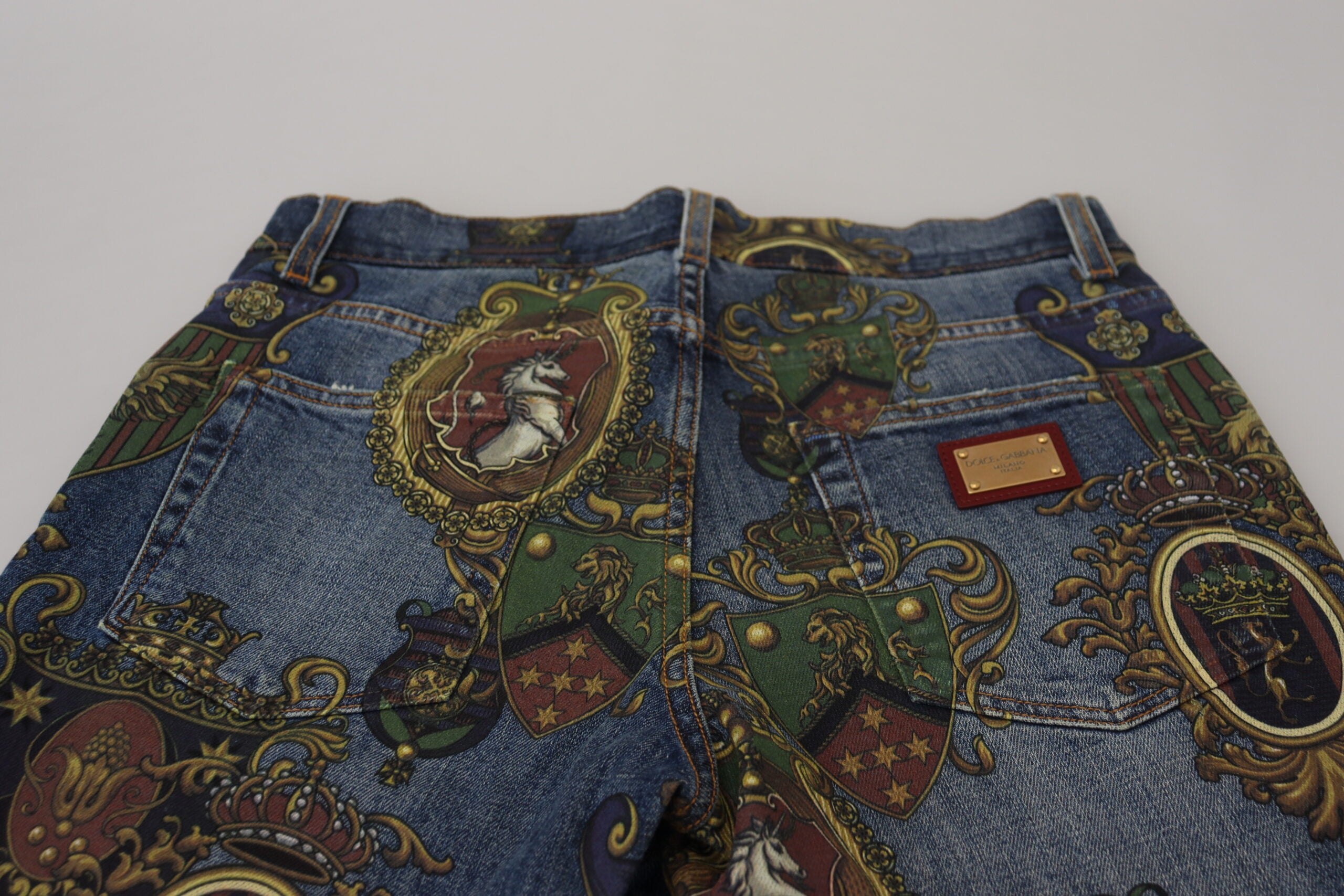 Dolce & Gabbana Blaue Medaillendruck Slim Fit Baumwolljeans