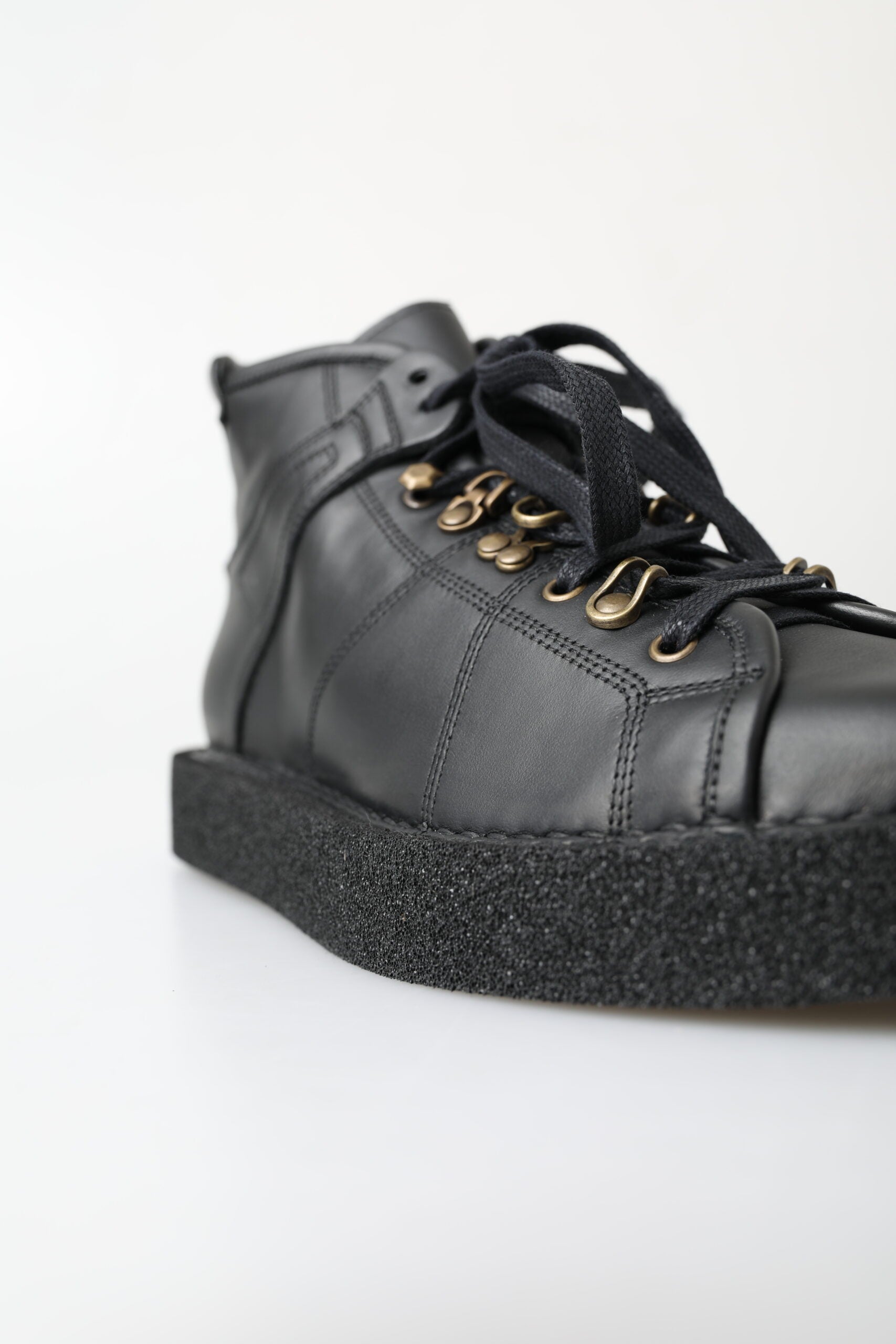 Dolce & Gabbana Schwarze Leder-Slipper mit Stretch-Stiefeln